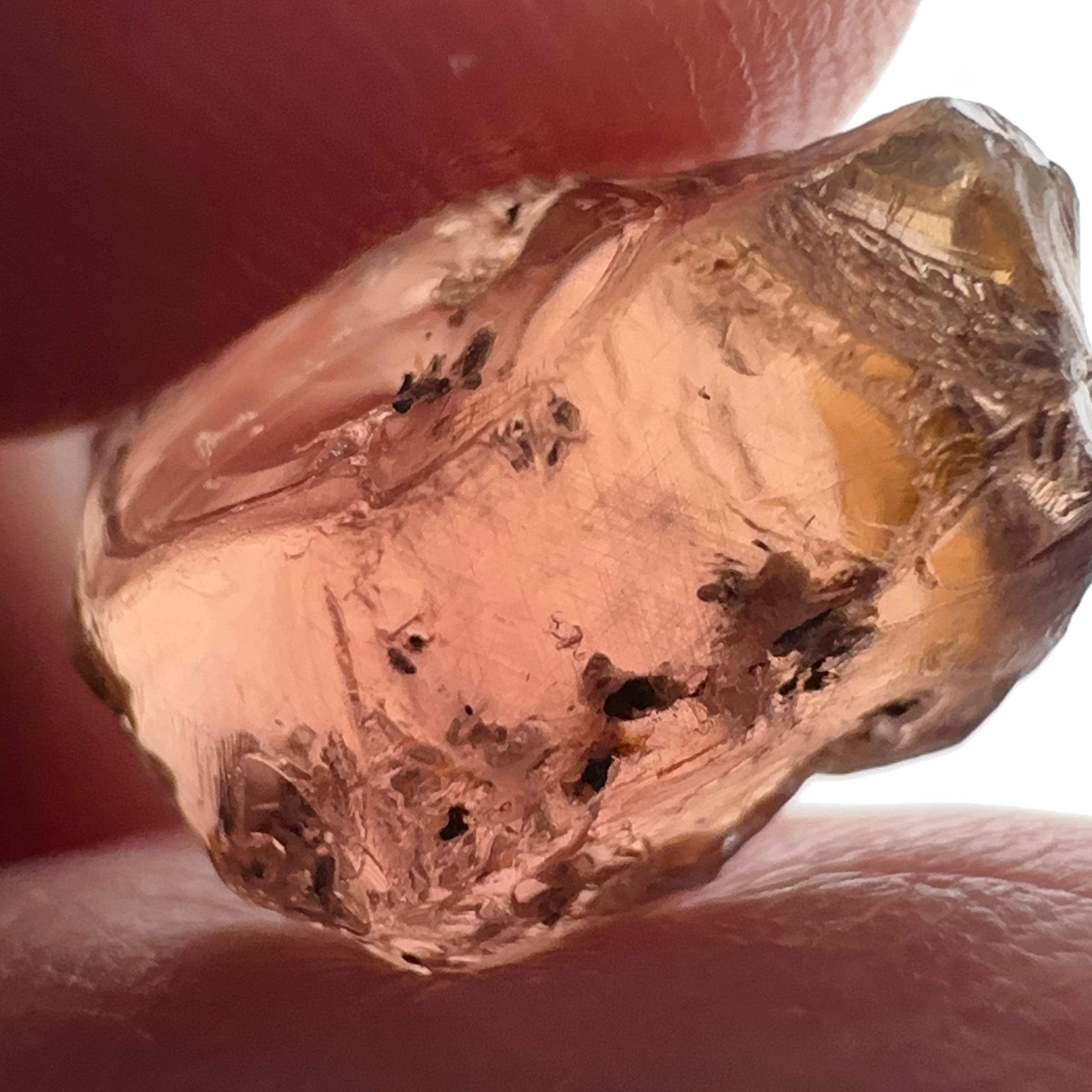 Peach Malaya Garnet, 11.56ct, silk and very fine needles, some inclusions (spots) on the outside of the stone that will come off on preforming,  Unheated Untreated, Umba Valley Tanzania