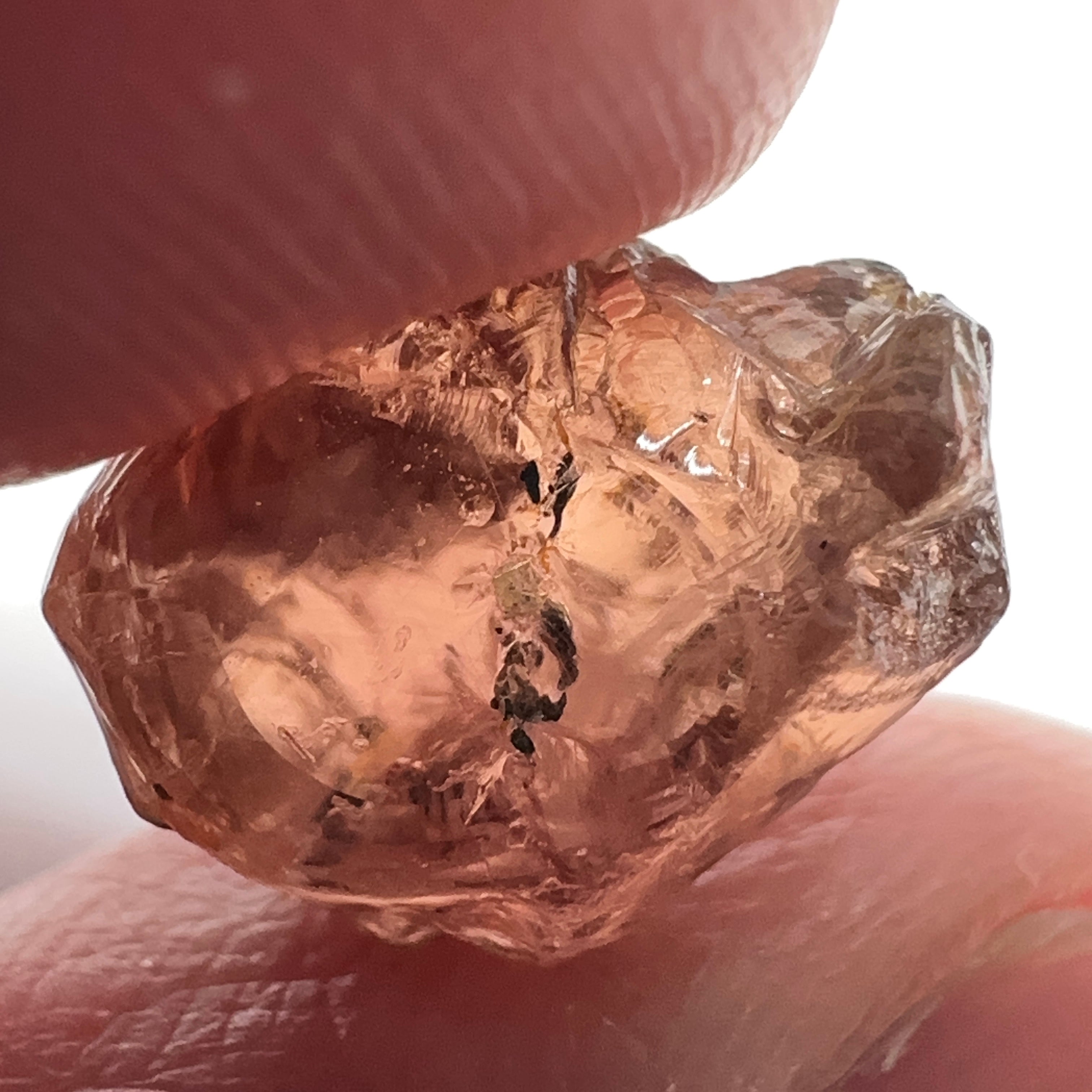 Peach Malaya Garnet, 11.56ct, silk and very fine needles, some inclusions (spots) on the outside of the stone that will come off on preforming,  Unheated Untreated, Umba Valley Tanzania