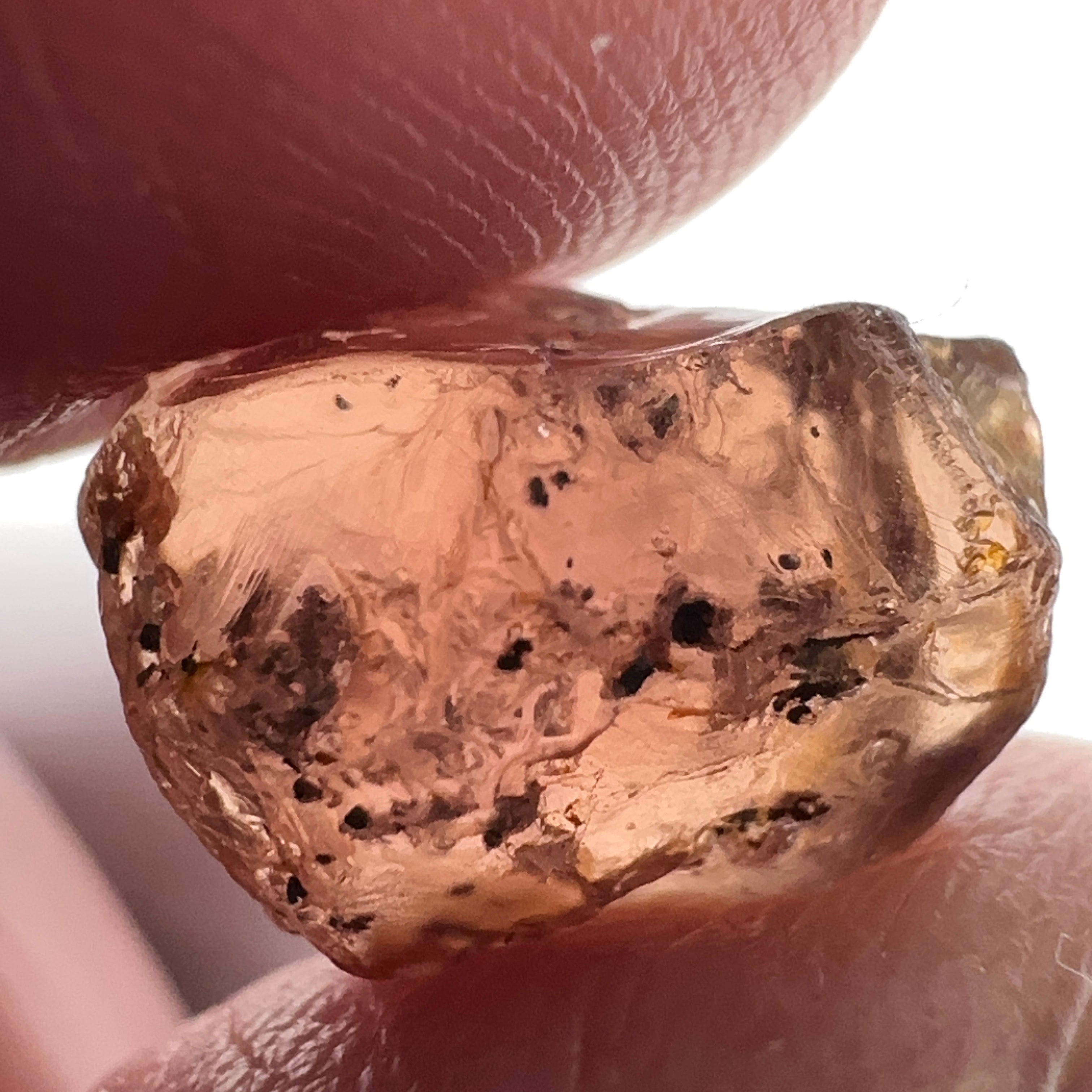 Peach Malaya Garnet, 11.56ct, silk and very fine needles, some inclusions (spots) on the outside of the stone that will come off on preforming,  Unheated Untreated, Umba Valley Tanzania