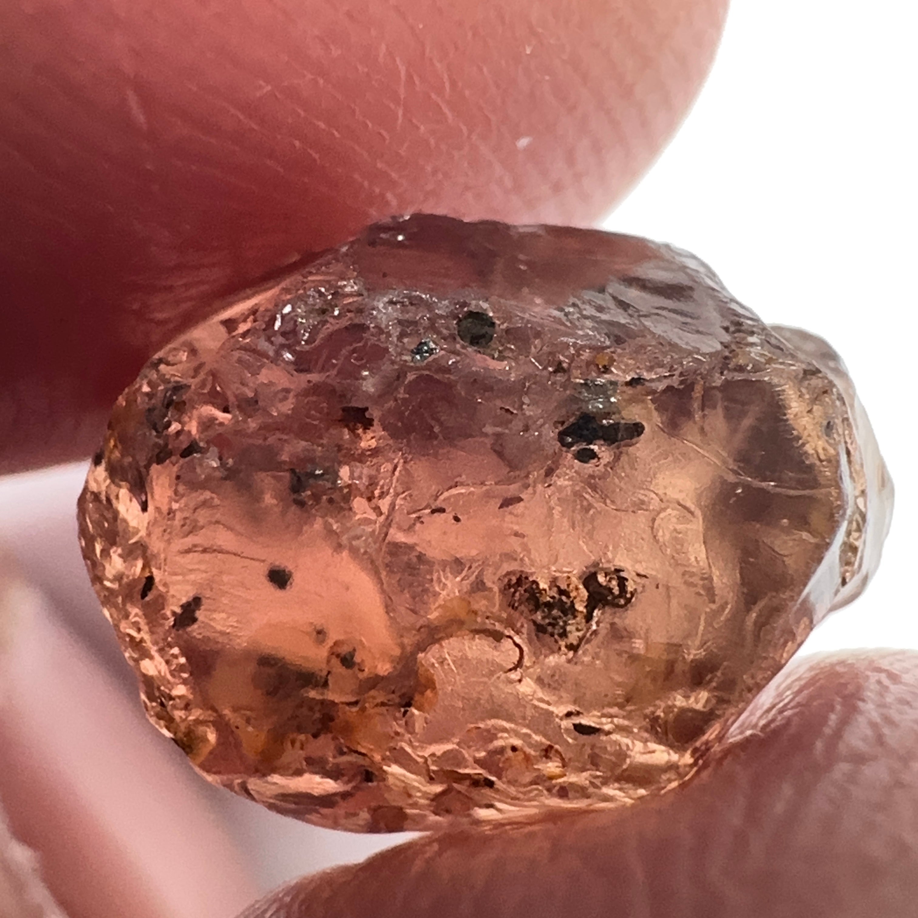 Peach Malaya Garnet, 11.56ct, silk and very fine needles, some inclusions (spots) on the outside of the stone that will come off on preforming,  Unheated Untreated, Umba Valley Tanzania