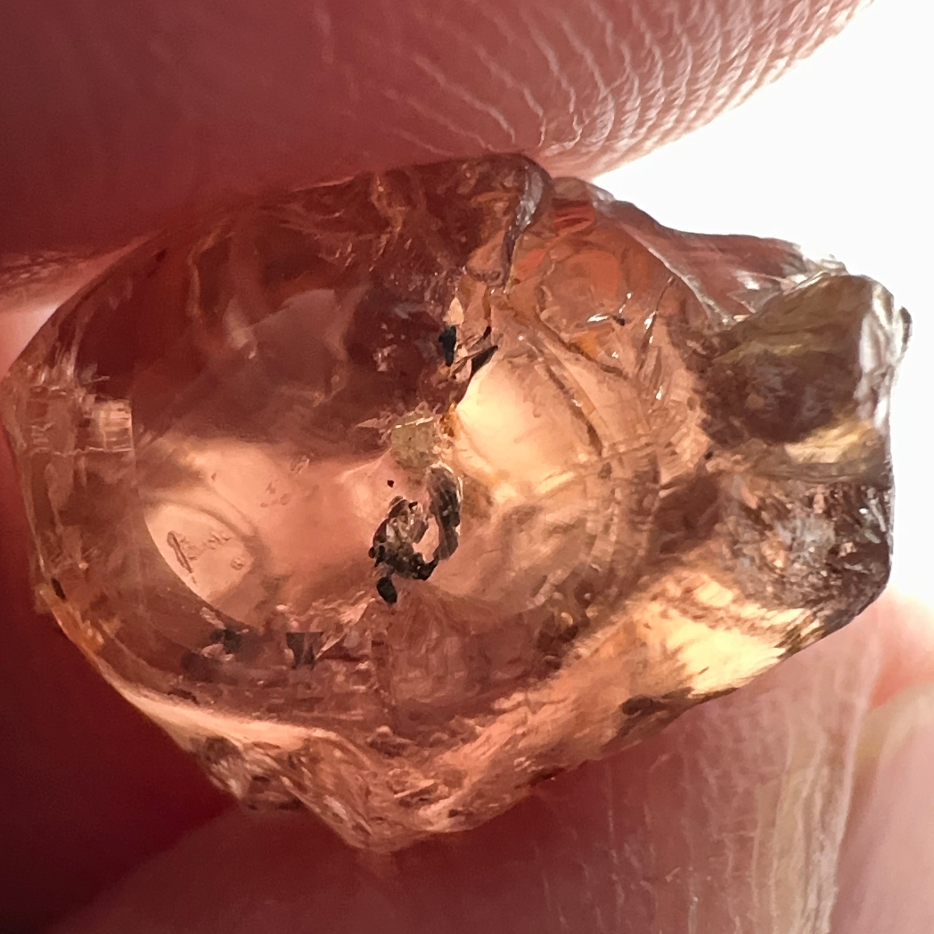 Peach Malaya Garnet, 11.56ct, silk and very fine needles, some inclusions (spots) on the outside of the stone that will come off on preforming,  Unheated Untreated, Umba Valley Tanzania