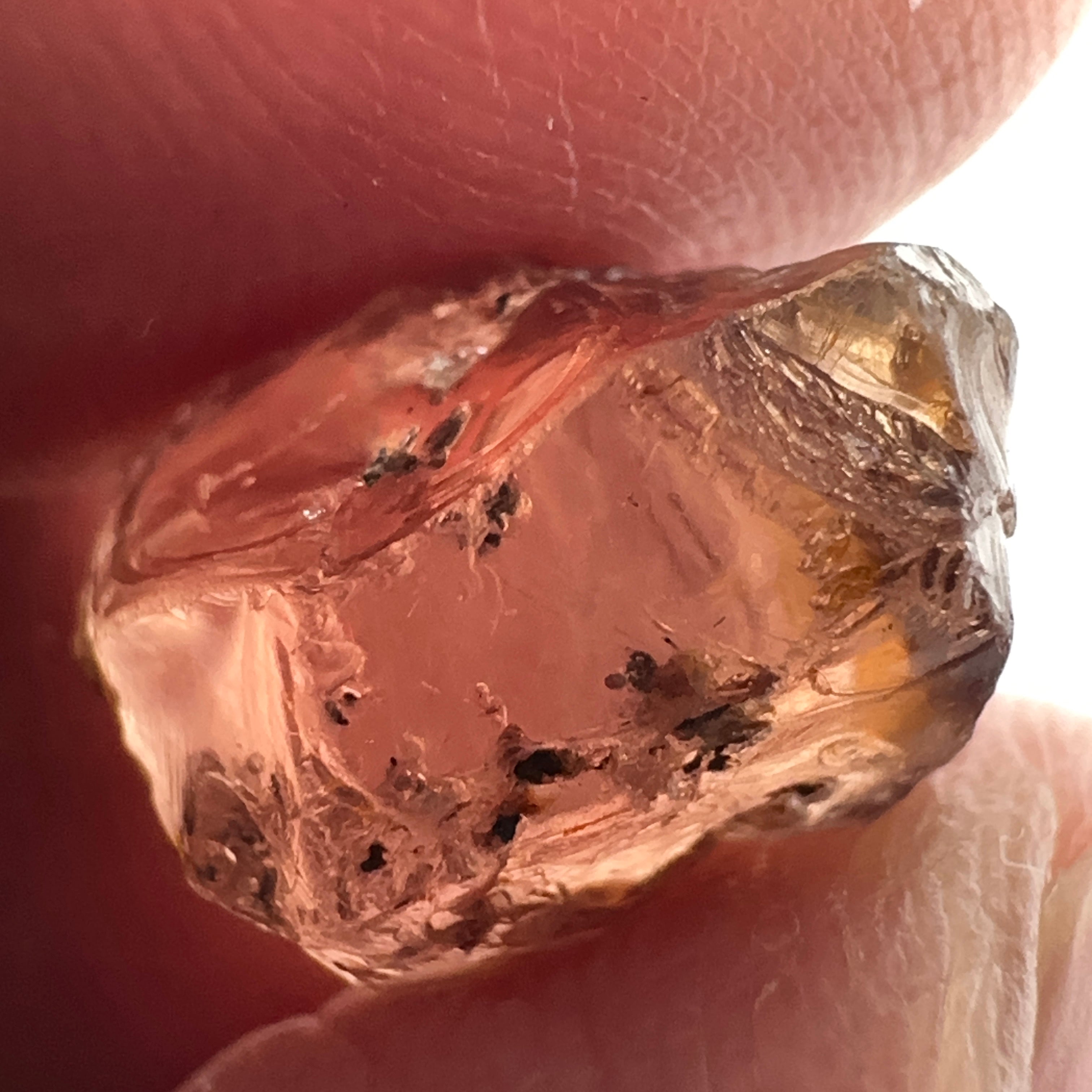 Peach Malaya Garnet, 11.56ct, silk and very fine needles, some inclusions (spots) on the outside of the stone that will come off on preforming,  Unheated Untreated, Umba Valley Tanzania