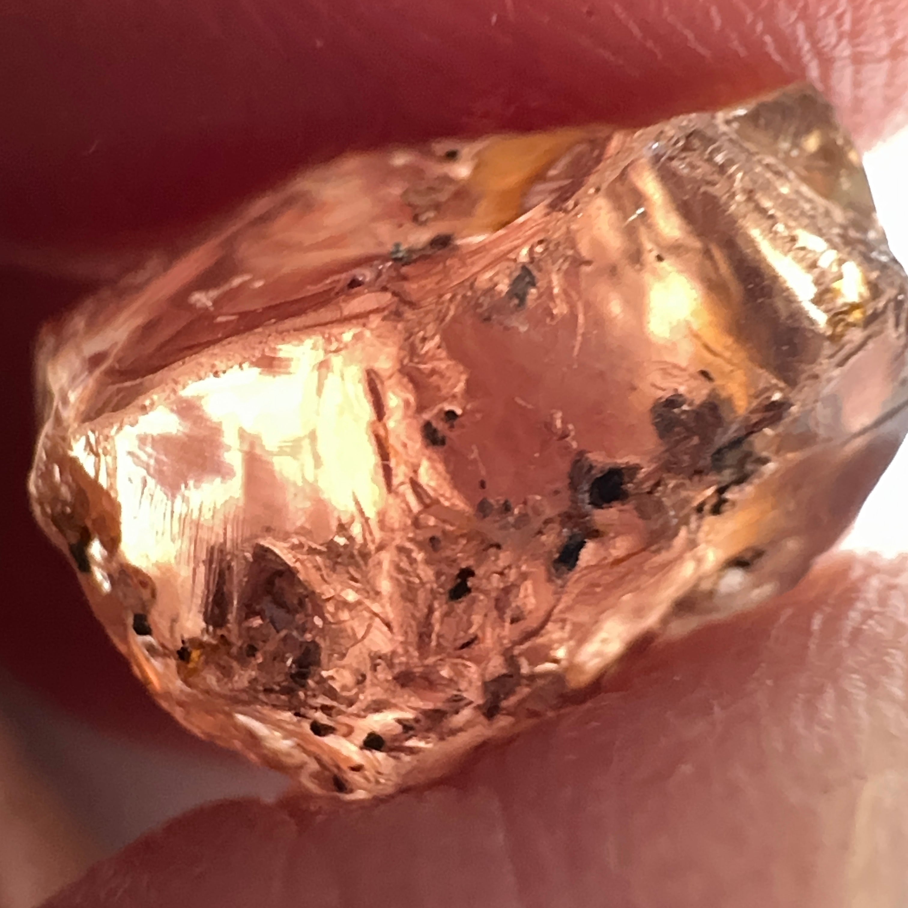 Peach Malaya Garnet, 11.56ct, silk and very fine needles, some inclusions (spots) on the outside of the stone that will come off on preforming,  Unheated Untreated, Umba Valley Tanzania