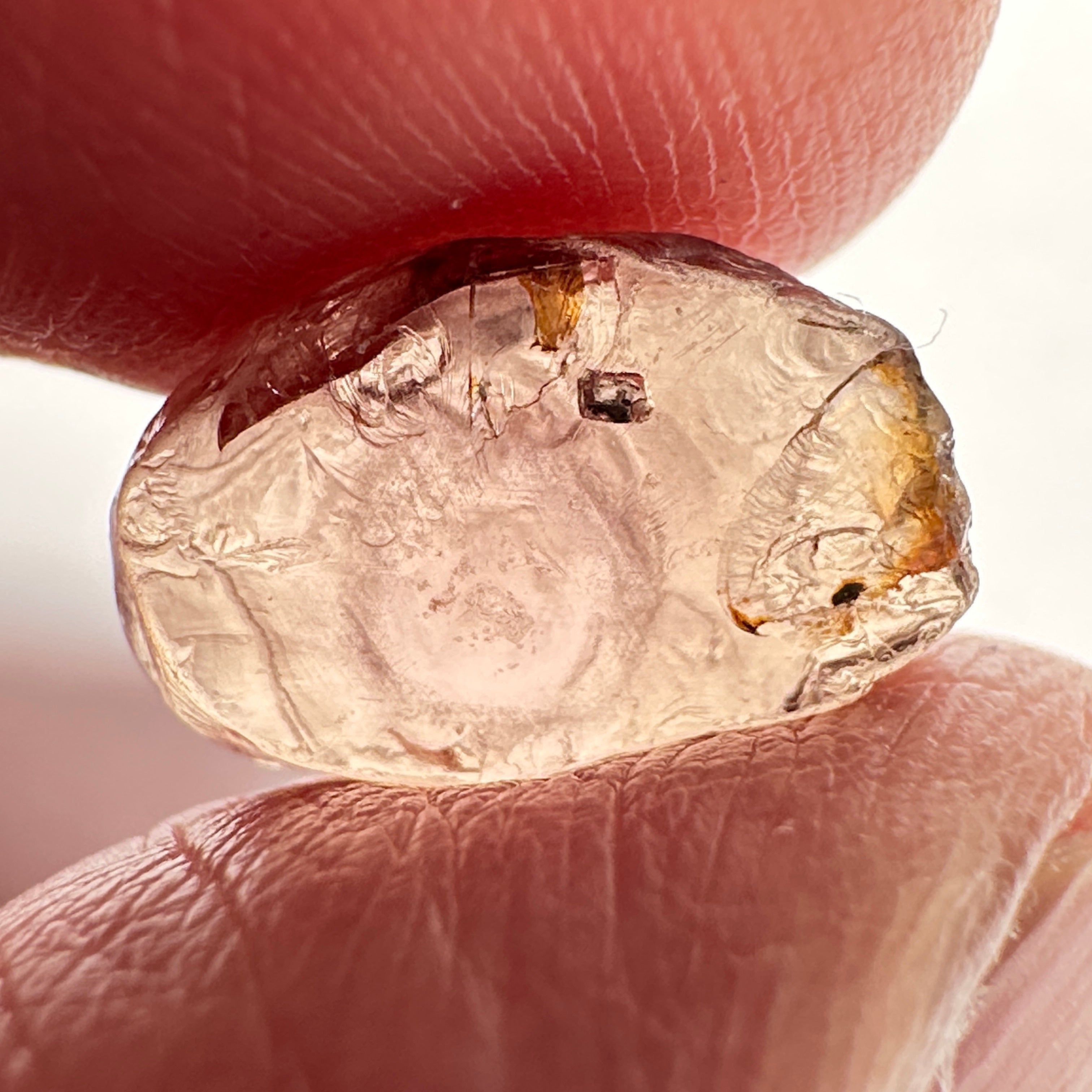 Peach Malaya Garnet, 6.37ct, silk that looks like an eye (see vid.) with a crystal inclusion on the side, flat stone , Unheated Untreated, Umba Valley Tanzania. See pictures to get the exact idea of depth