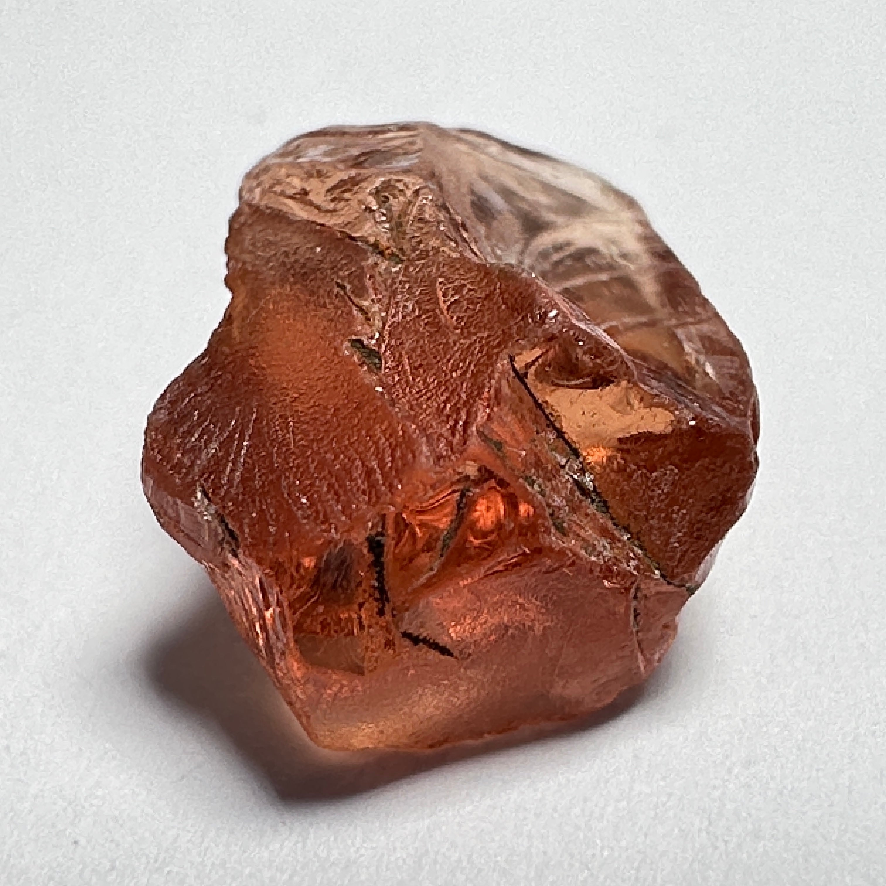 Peach Malaya Garnet, 5.97ct, vvs-if with slight crack on skin, challenging shape, Unheated Untreated, Umba Valley Tanzania