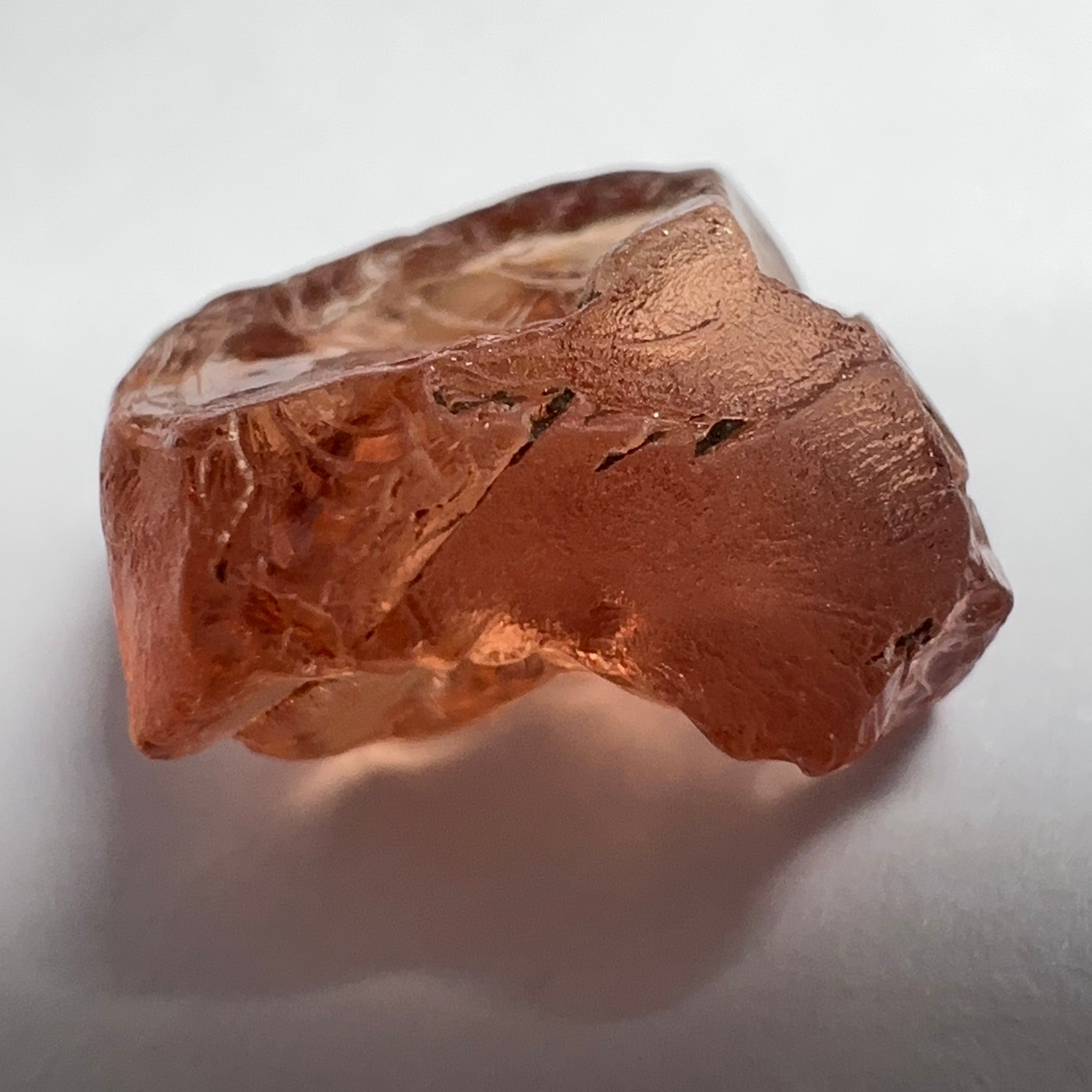 Peach Malaya Garnet, 5.97ct, vvs-if with slight crack on skin, challenging shape, Unheated Untreated, Umba Valley Tanzania