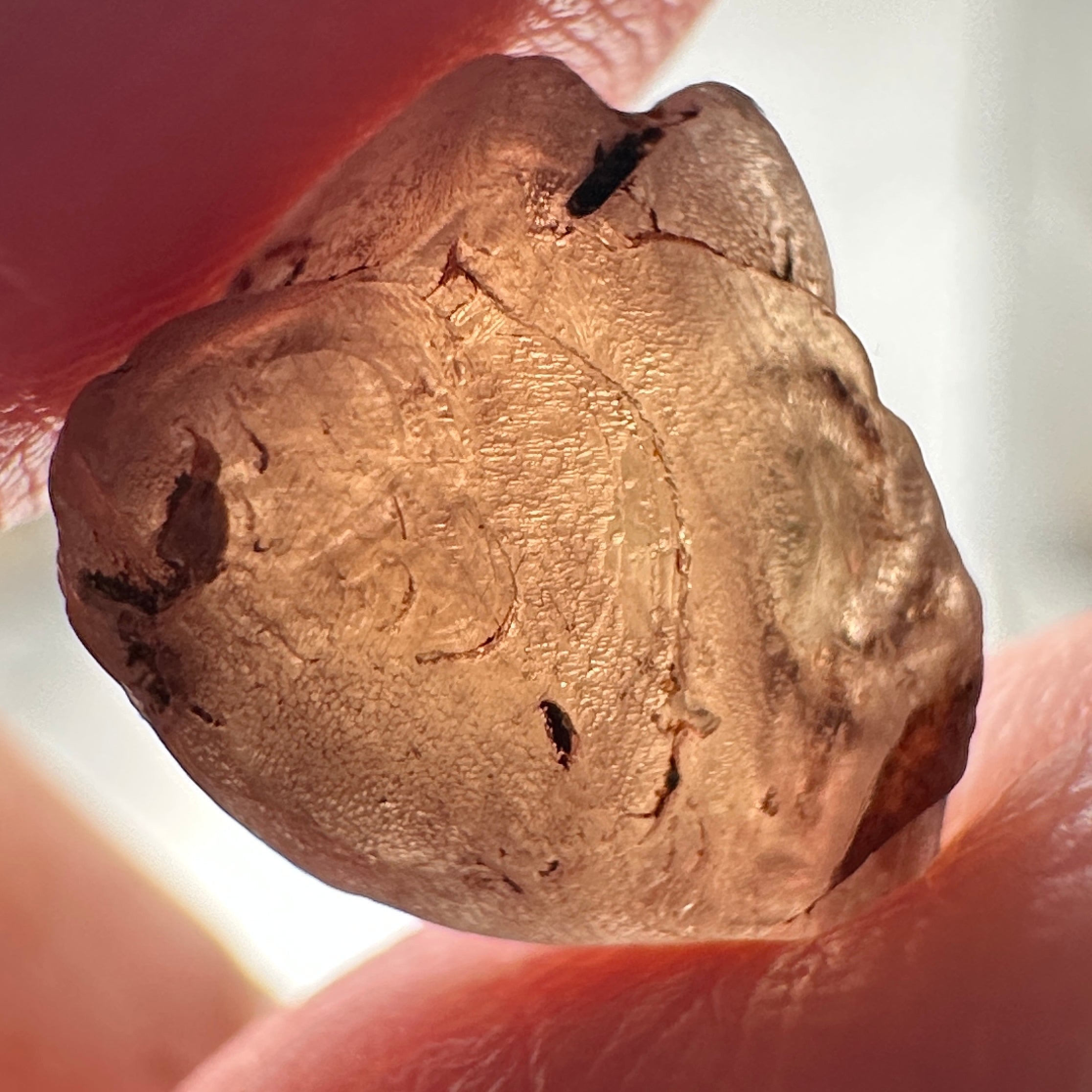 Peach Malaya Garnet, 8.40ct, vvs-if (no inclusions cracks or bubbles) with silk, Unheated Untreated, Umba Valley Tanzania. Shape is a little flat, see pictures to get the exact idea of depth