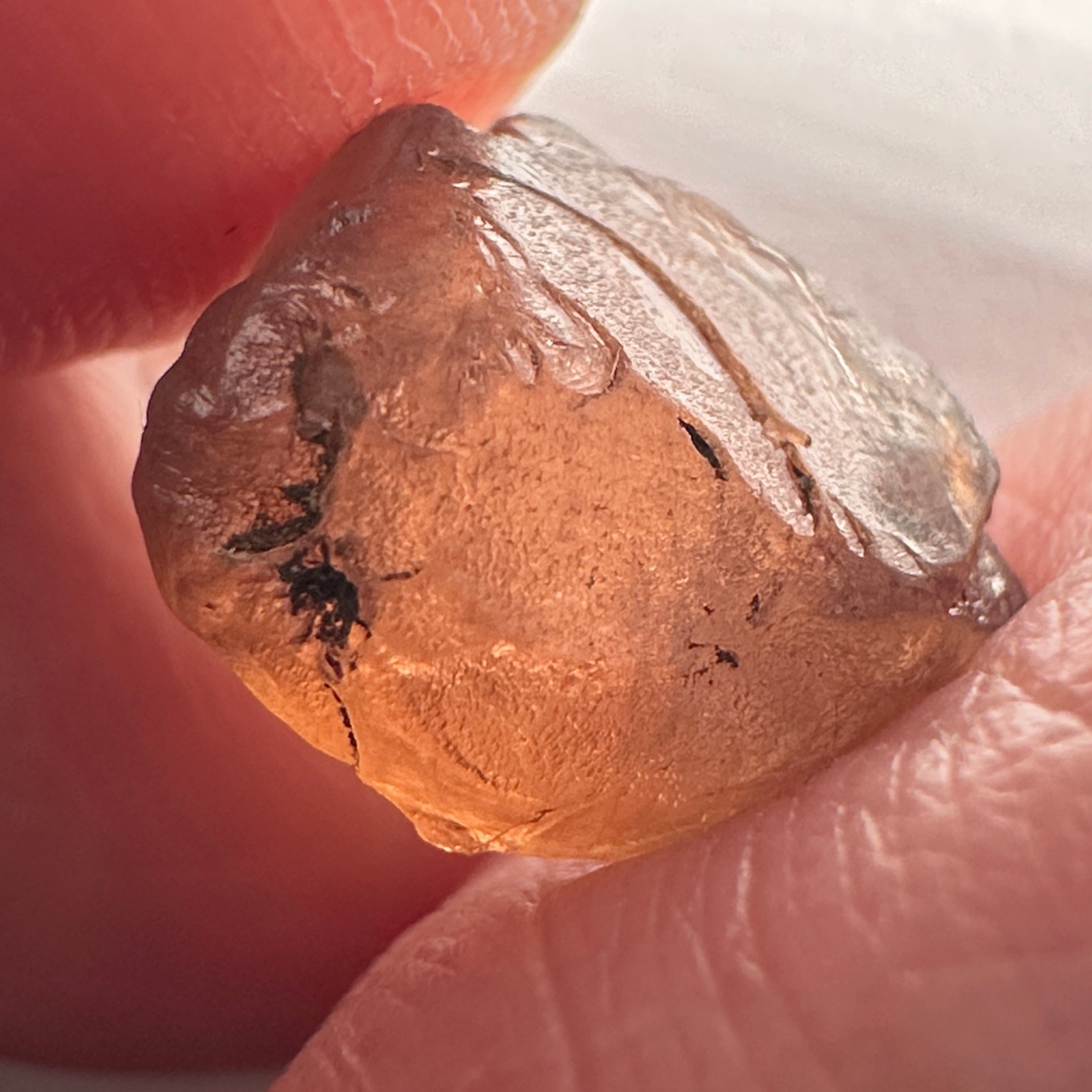 Peach Malaya Garnet, 8.40ct, vvs-if (no inclusions cracks or bubbles) with silk, Unheated Untreated, Umba Valley Tanzania. Shape is a little flat, see pictures to get the exact idea of depth