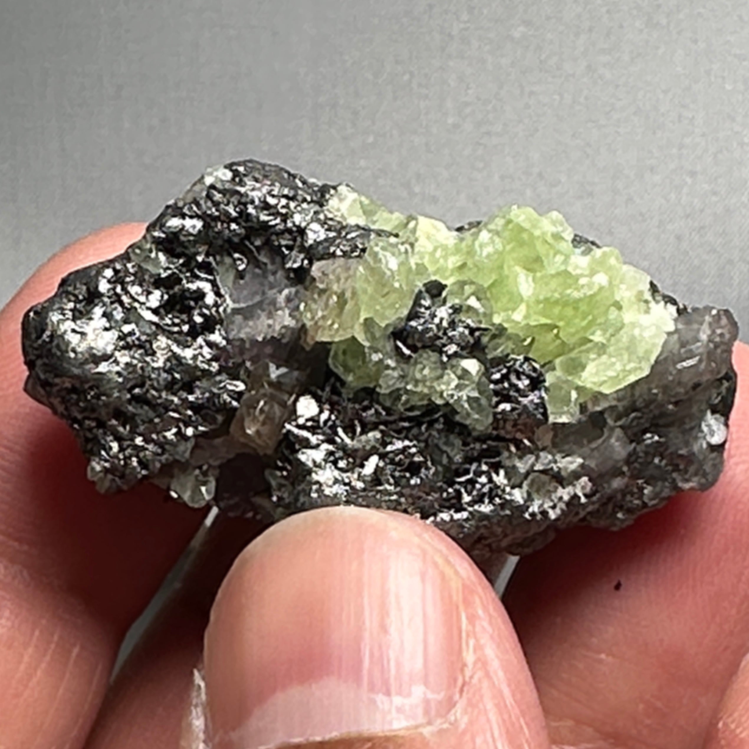 Diopside with Tanzanite Crystal, 114.50ct, Merelani, Tanzania. I have circled the Tanzanite part in the pictures