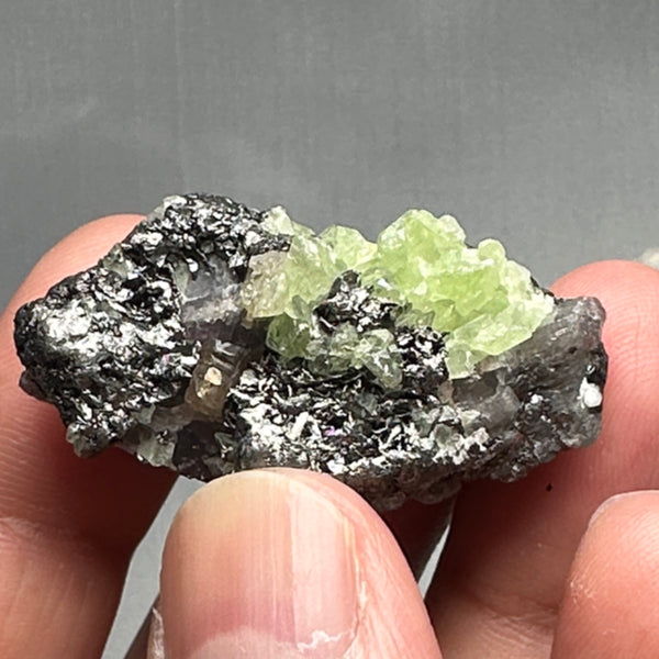 Diopside with Tanzanite Crystal, 114.50ct, Merelani, Tanzania. I have circled the Tanzanite part in the pictures