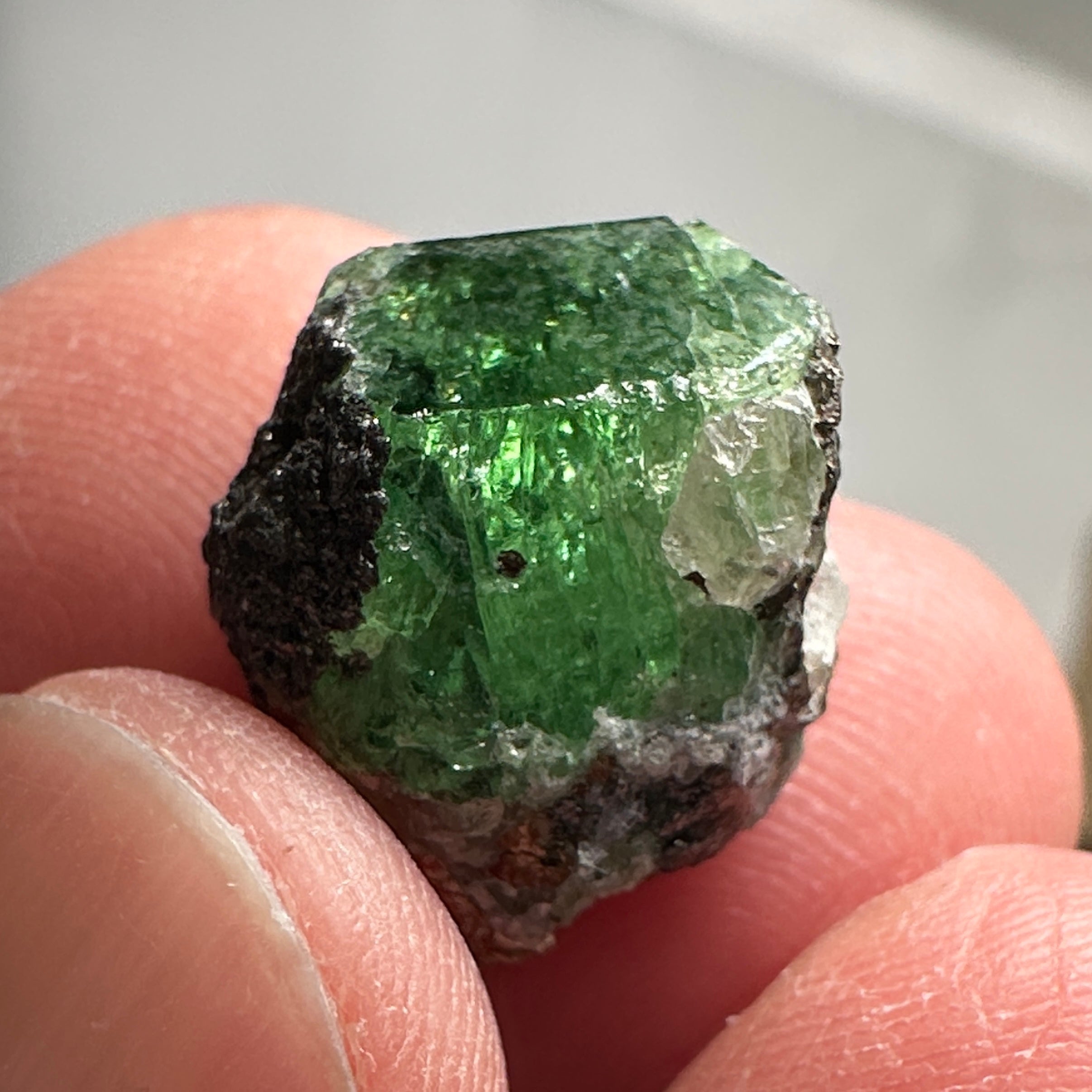 Tsavorite Garnet on matrix with pyrite, 20.44ct, Merelani, Tanzania