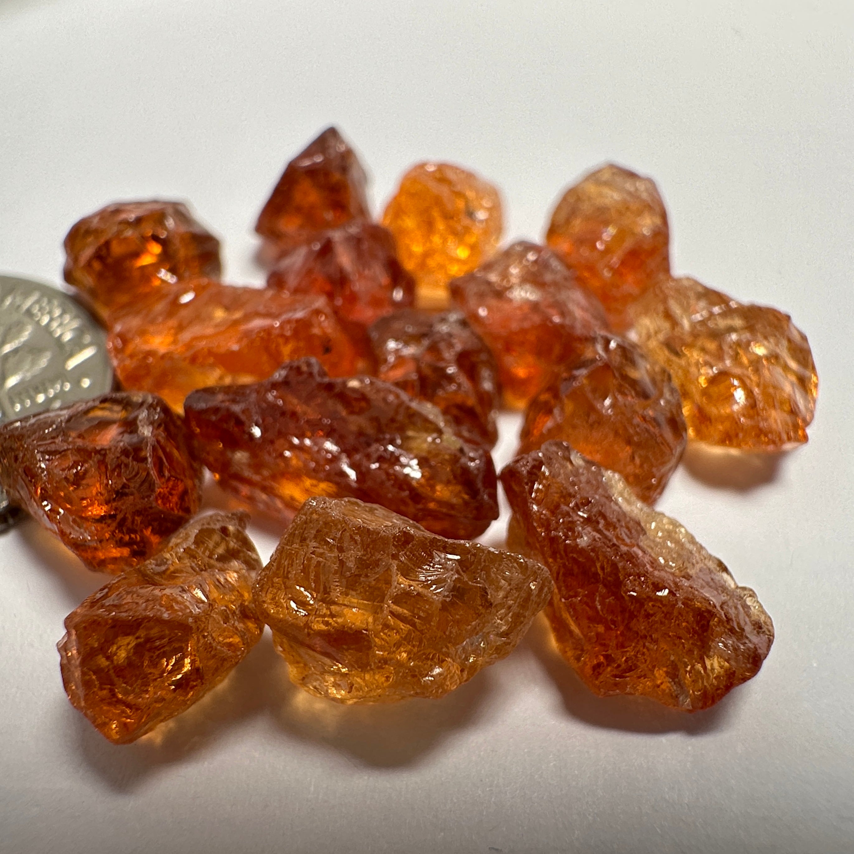 Spessartite lot, 44.11ct, mixed clarities, Tanzania, av. size 2.94ct