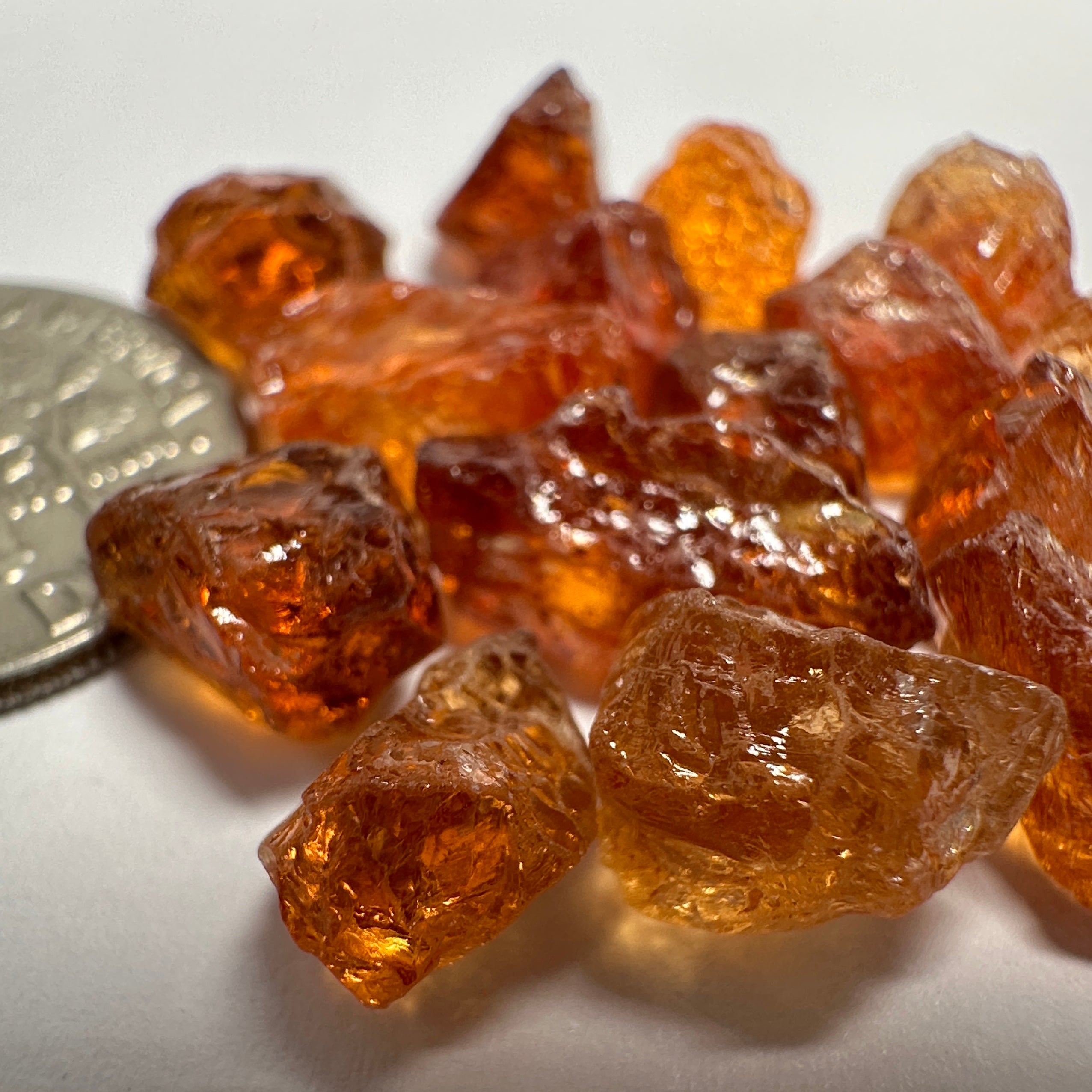 Spessartite lot, 44.11ct, mixed clarities, Tanzania, av. size 2.94ct