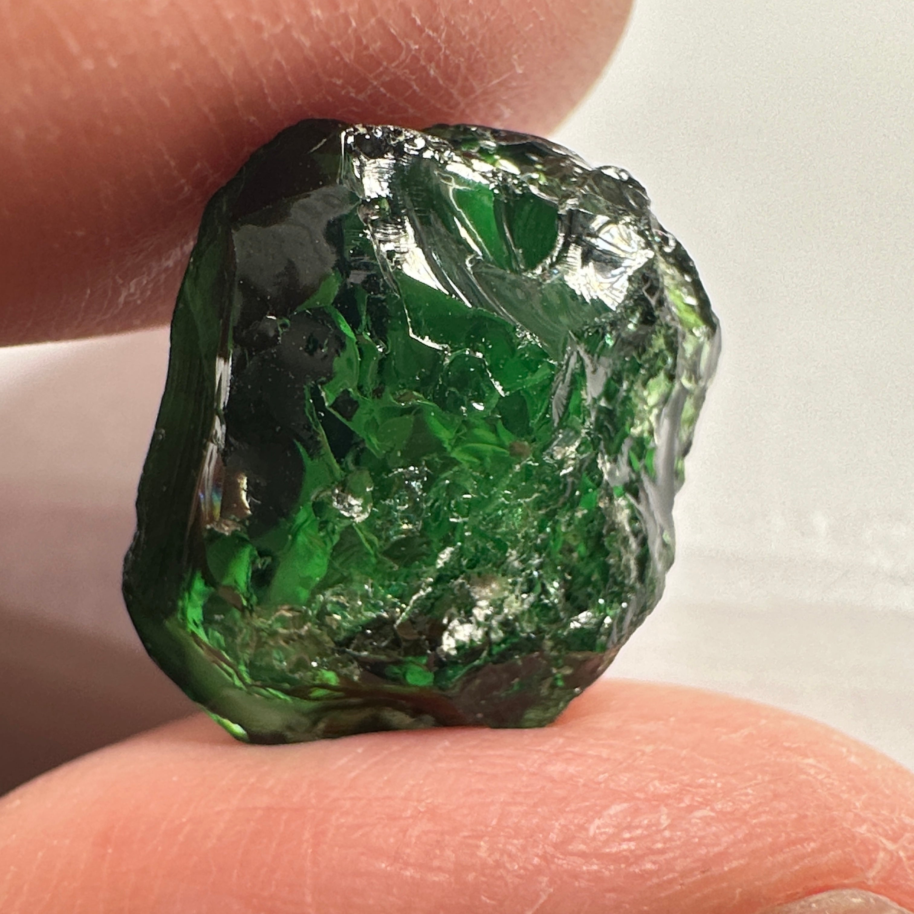 Chrome Tourmaline, 14.90ct, Tanzania, Untreated Unheated, VVS-IF with one spot, I have circled the spot in red on one of the pictures, stone is dark and shown in different lights and backgrounds, see all pictures.