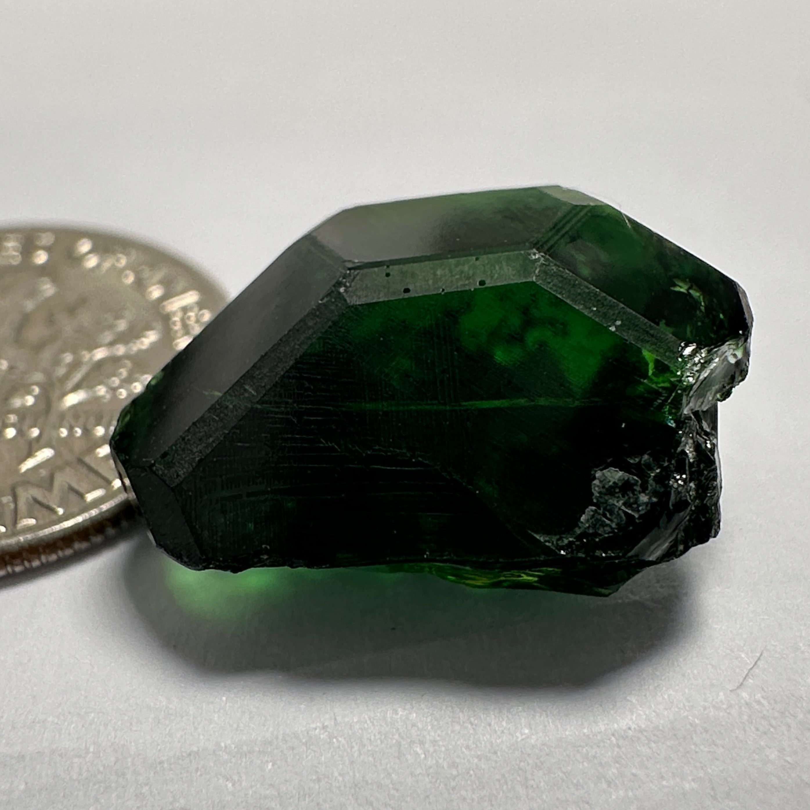 Chrome Tourmaline, 14.90ct, Tanzania, Untreated Unheated, VVS-IF with one spot, I have circled the spot in red on one of the pictures, stone is dark and shown in different lights and backgrounds, see all pictures.