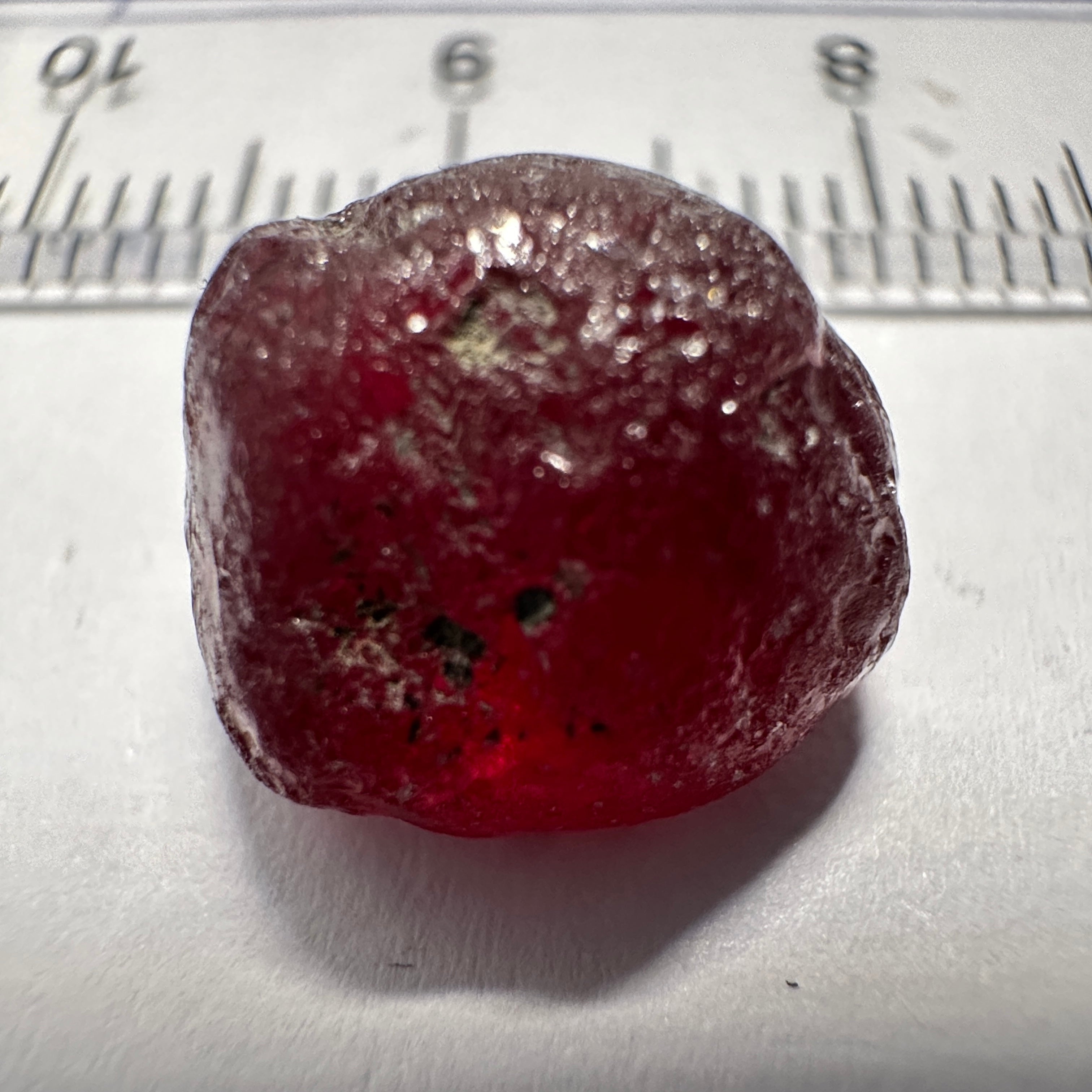 Garnet, 11.85ct, Tanzania, Untreated Unheated, darkish stone with a few black spots