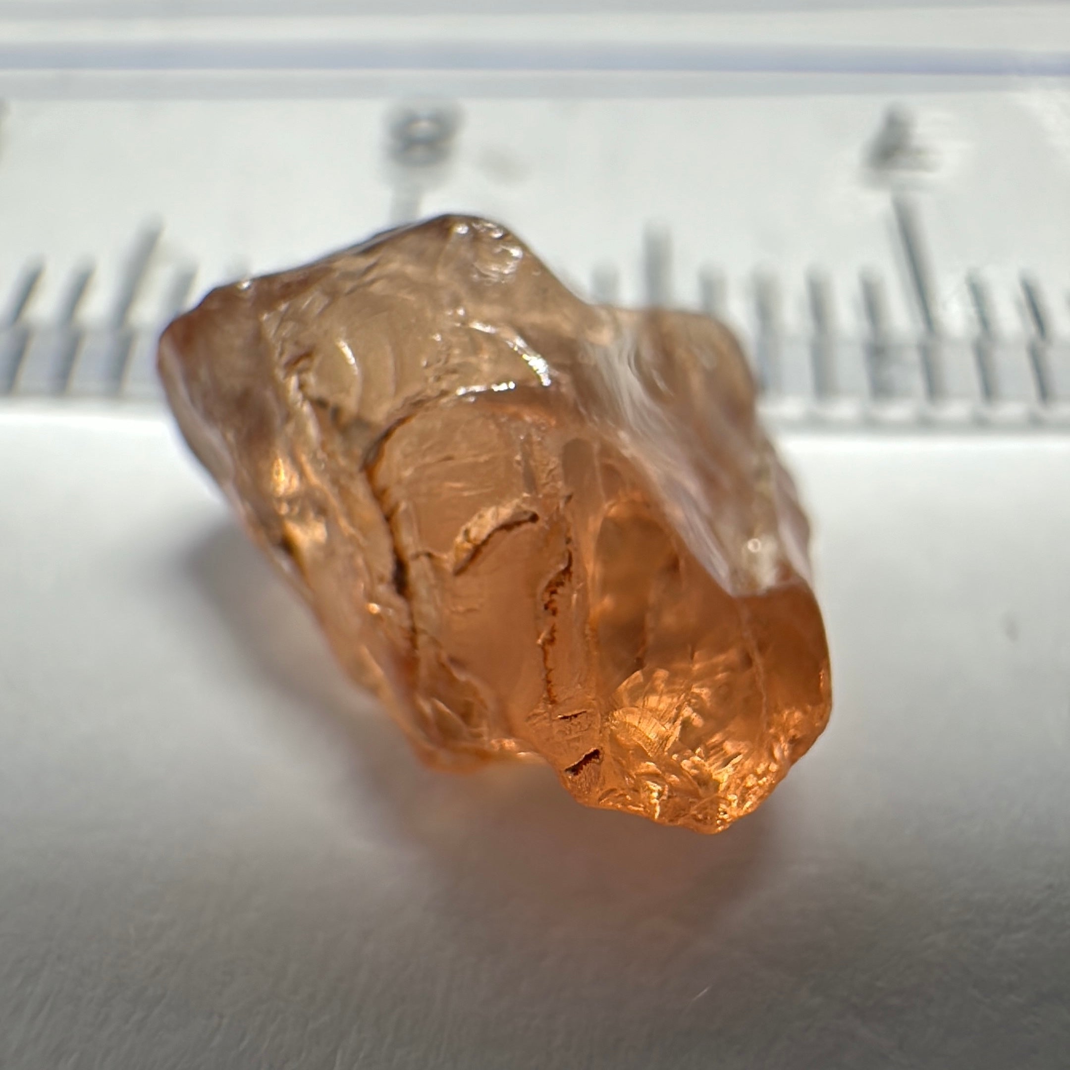 Peach Malaya Garnet, 3.97ct, challenging shape, gunk on outside, will come off on preform, rest vvs, Unheated Untreated, Umba Valley Tanzania