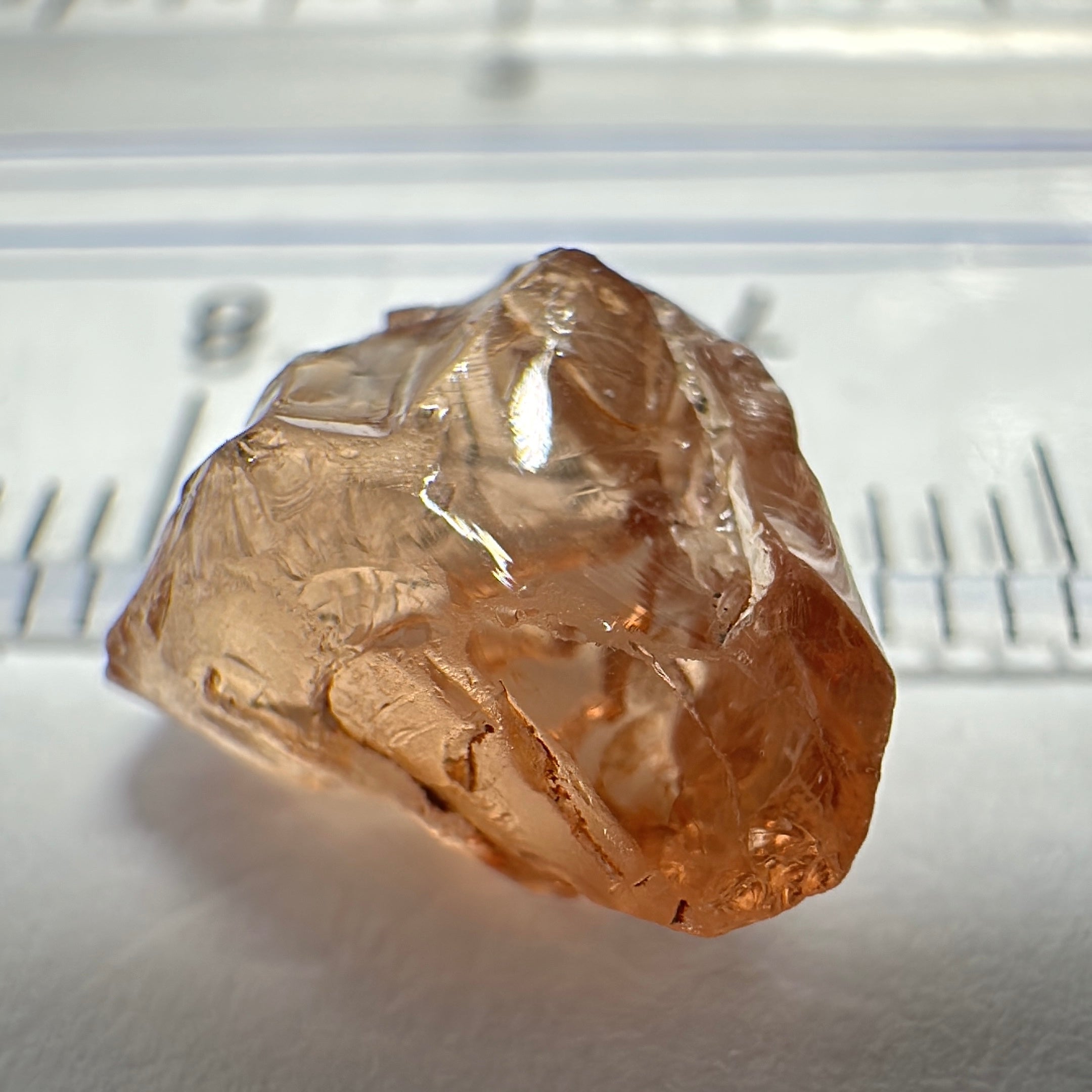 Peach Malaya Garnet, 3.97ct, challenging shape, gunk on outside, will come off on preform, rest vvs, Unheated Untreated, Umba Valley Tanzania