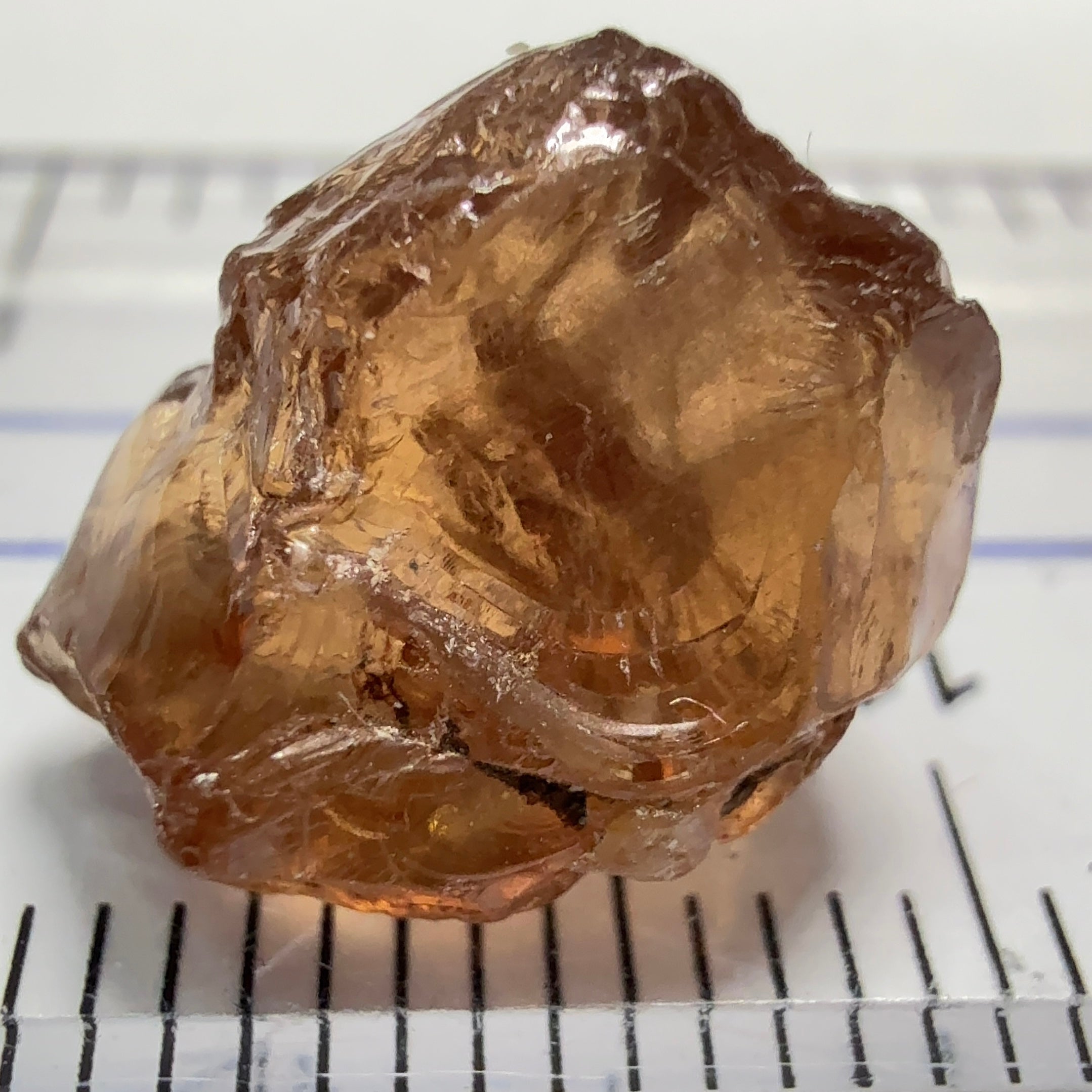 Peach Malaya Garnet, 8.21ct, silk and slight needles but no inclusions, Unheated Untreated, Umba Valley Tanzania, complicated shape.