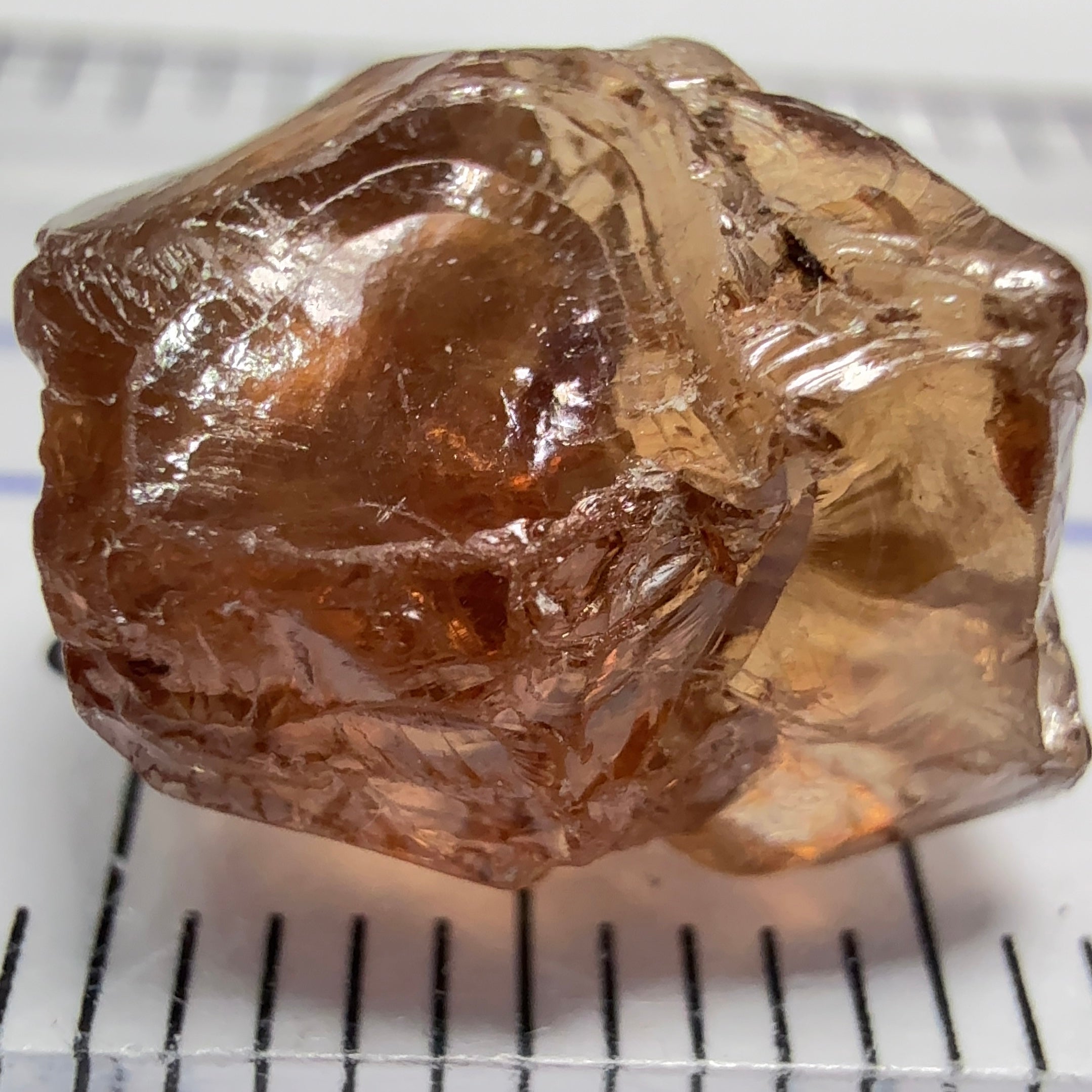 Peach Malaya Garnet, 8.21ct, silk and slight needles but no inclusions, Unheated Untreated, Umba Valley Tanzania, complicated shape.