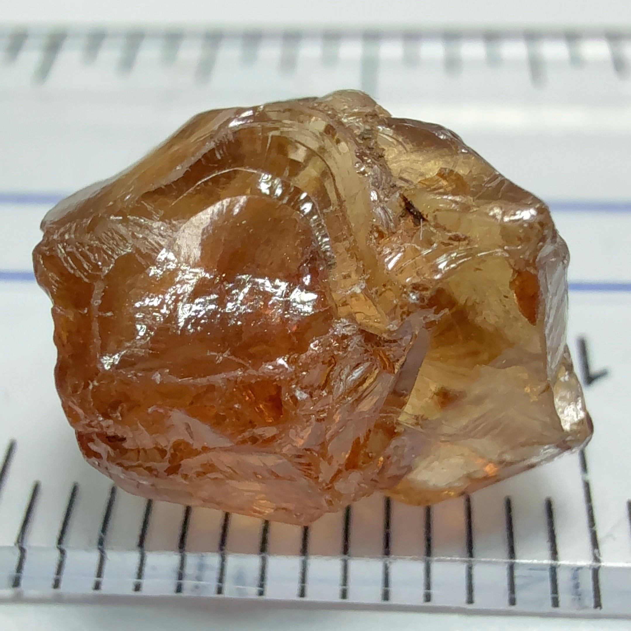 Peach Malaya Garnet, 8.21ct, silk and slight needles but no inclusions, Unheated Untreated, Umba Valley Tanzania, complicated shape.