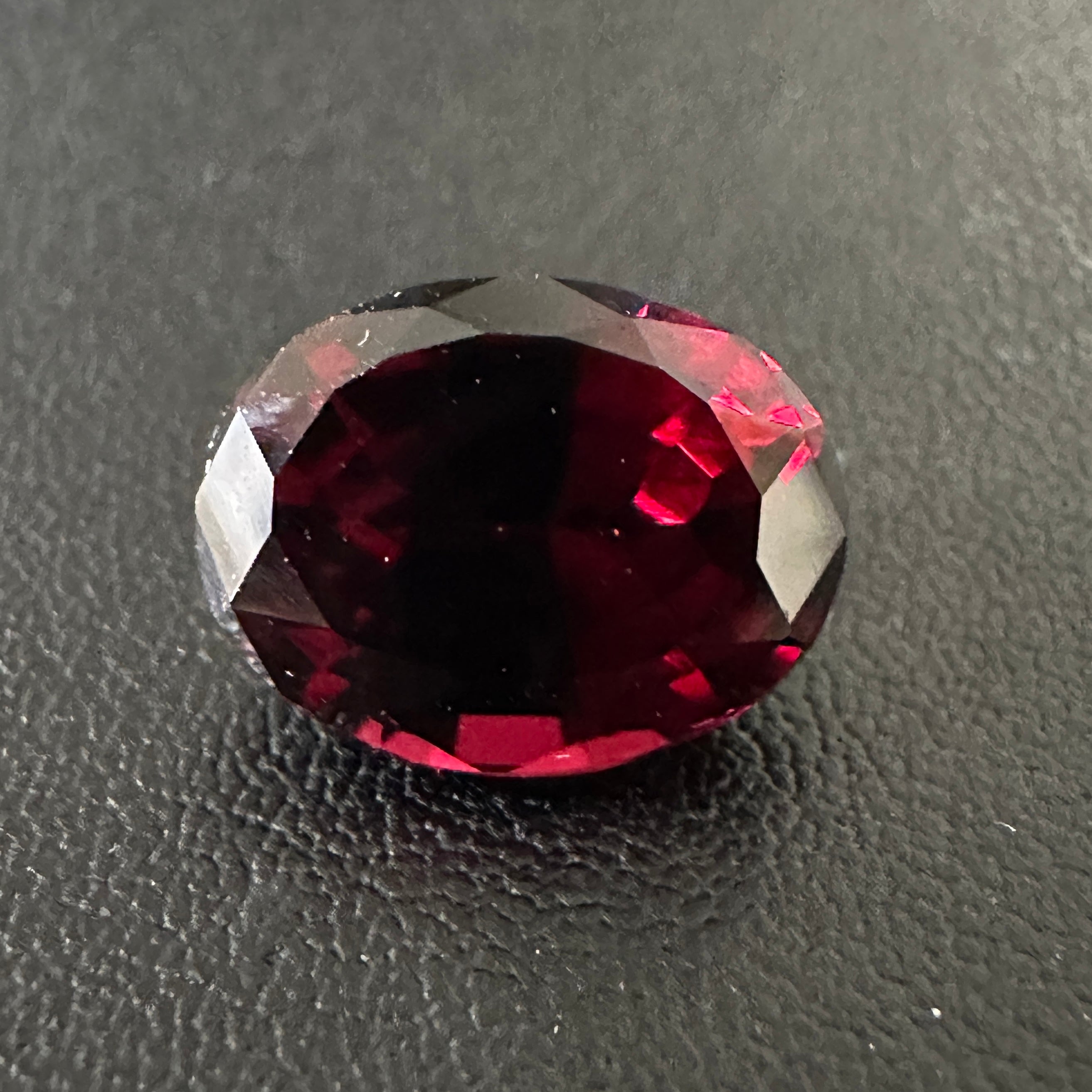 Dark Umbalite Garnet, 3.90ct, Tanzania, Untreated Unheated, see photos on black background