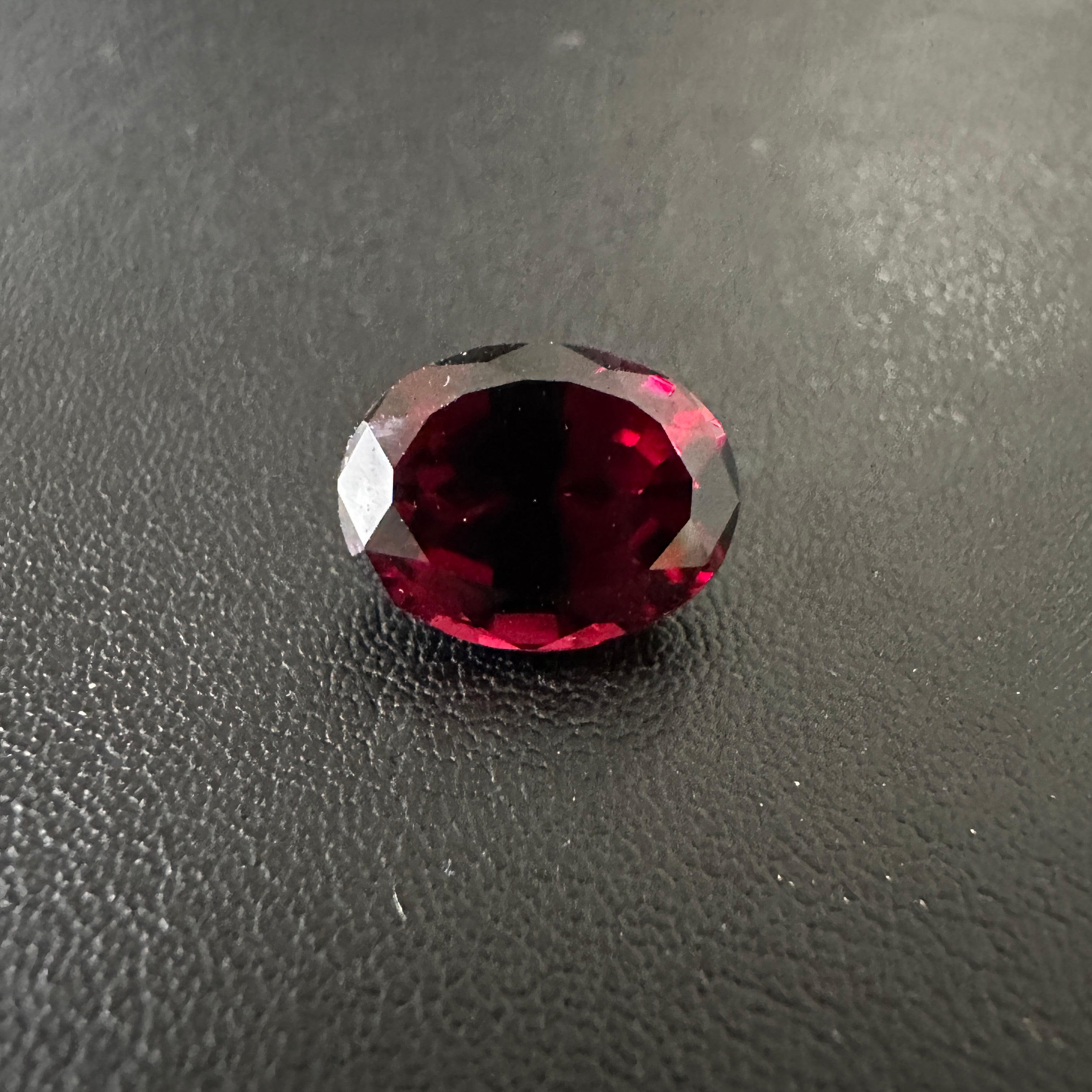 Dark Umbalite Garnet, 3.90ct, Tanzania, Untreated Unheated, see photos on black background