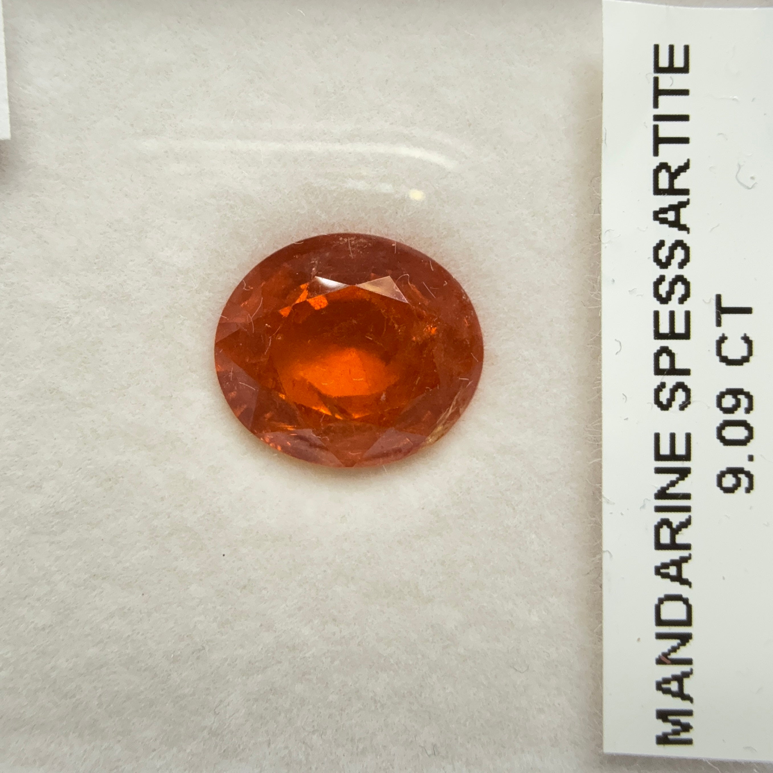 Mandarin Spessartite Garnet, 9.09ct, Untreated Unheated. 12.8 x 11.2 x 6.8mm, stone has some veils, slight sugar and inclusions