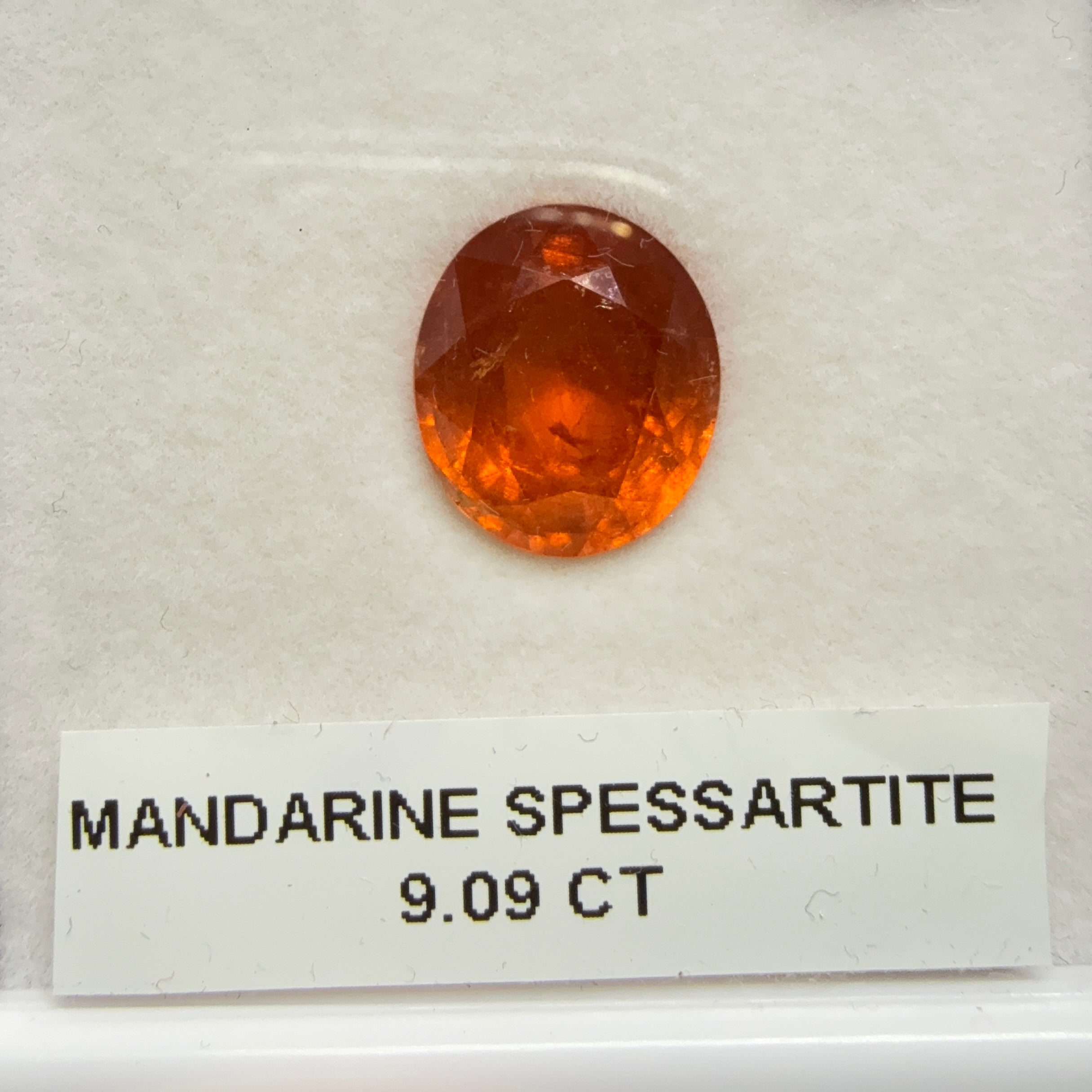 Mandarin Spessartite Garnet, 9.09ct, Untreated Unheated. 12.8 x 11.2 x 6.8mm, stone has some veils, slight sugar and inclusions