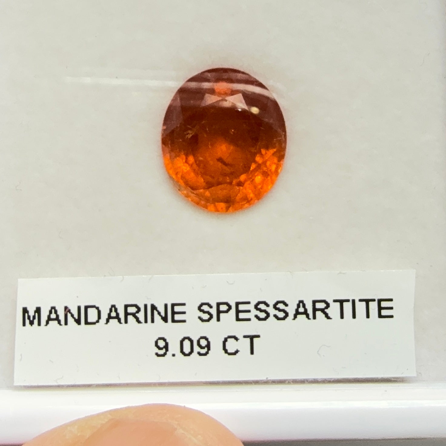 Mandarin Spessartite Garnet, 9.09ct, Untreated Unheated. 12.8 x 11.2 x 6.8mm, stone has some veils, slight sugar and inclusions