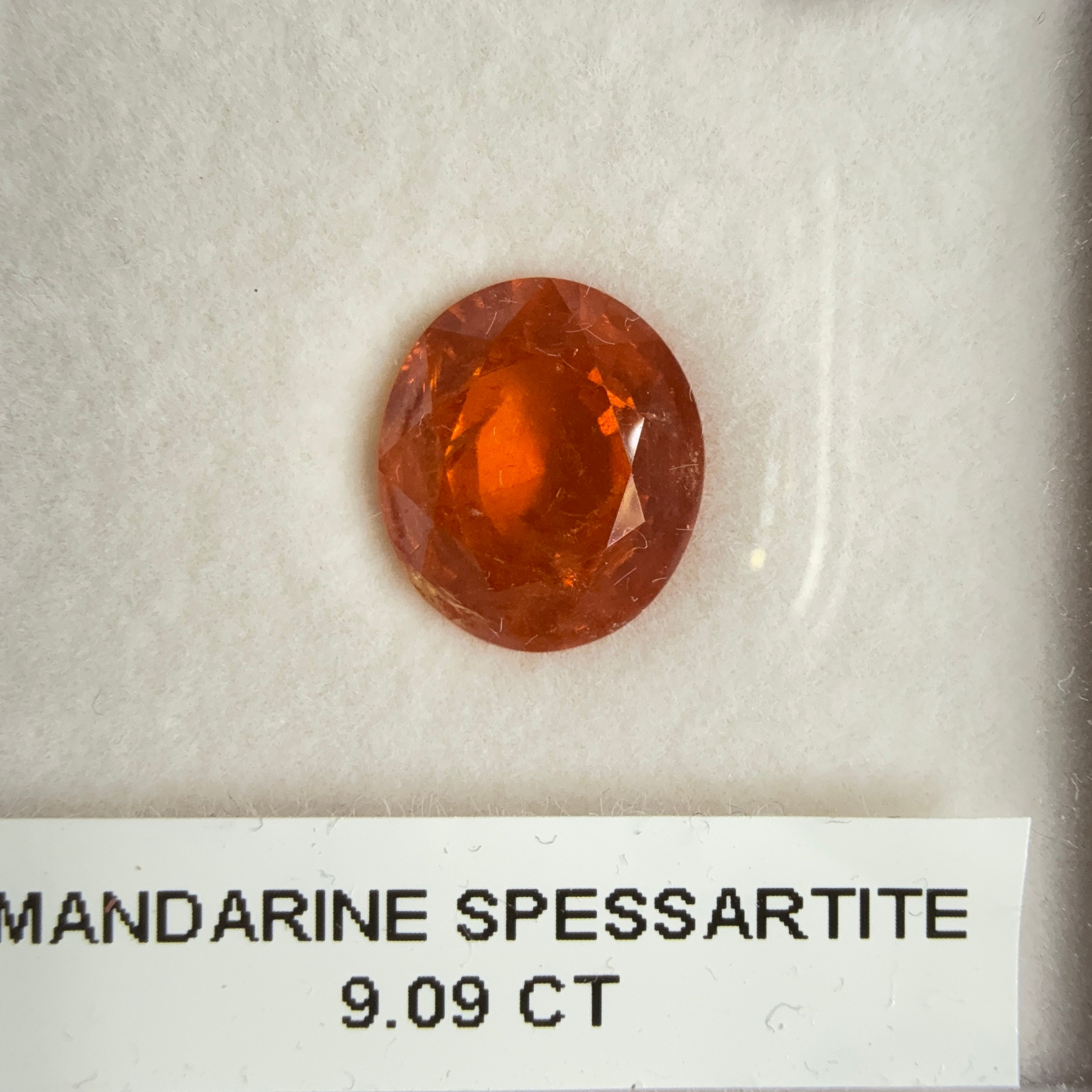 Mandarin Spessartite Garnet, 9.09ct, Untreated Unheated. 12.8 x 11.2 x 6.8mm, stone has some veils, slight sugar and inclusions