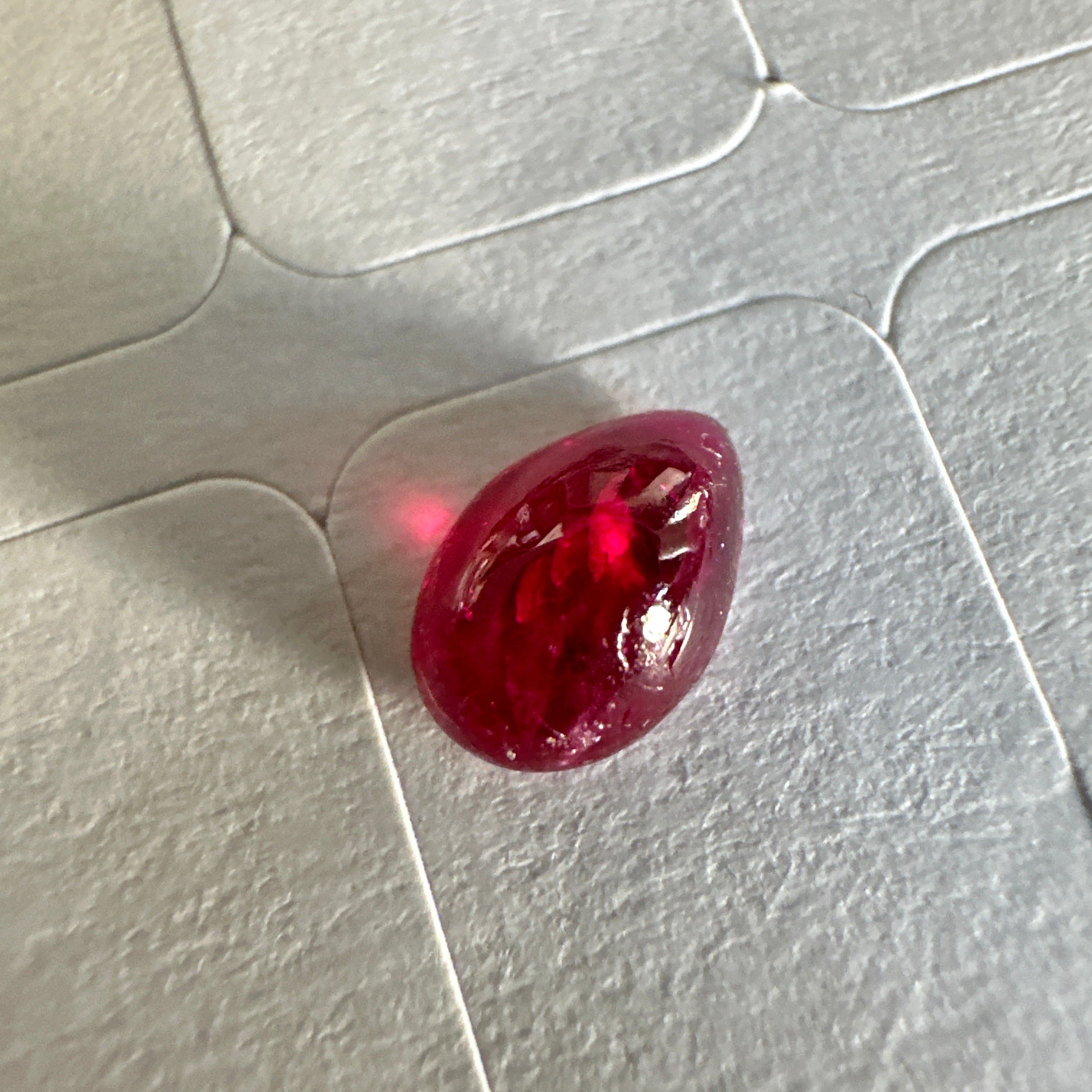 0.84ct Ruby Cabochon, Longido Mines, Tanzania. Untreated Unheated, this cab does have groves on the dome but fantastic colour