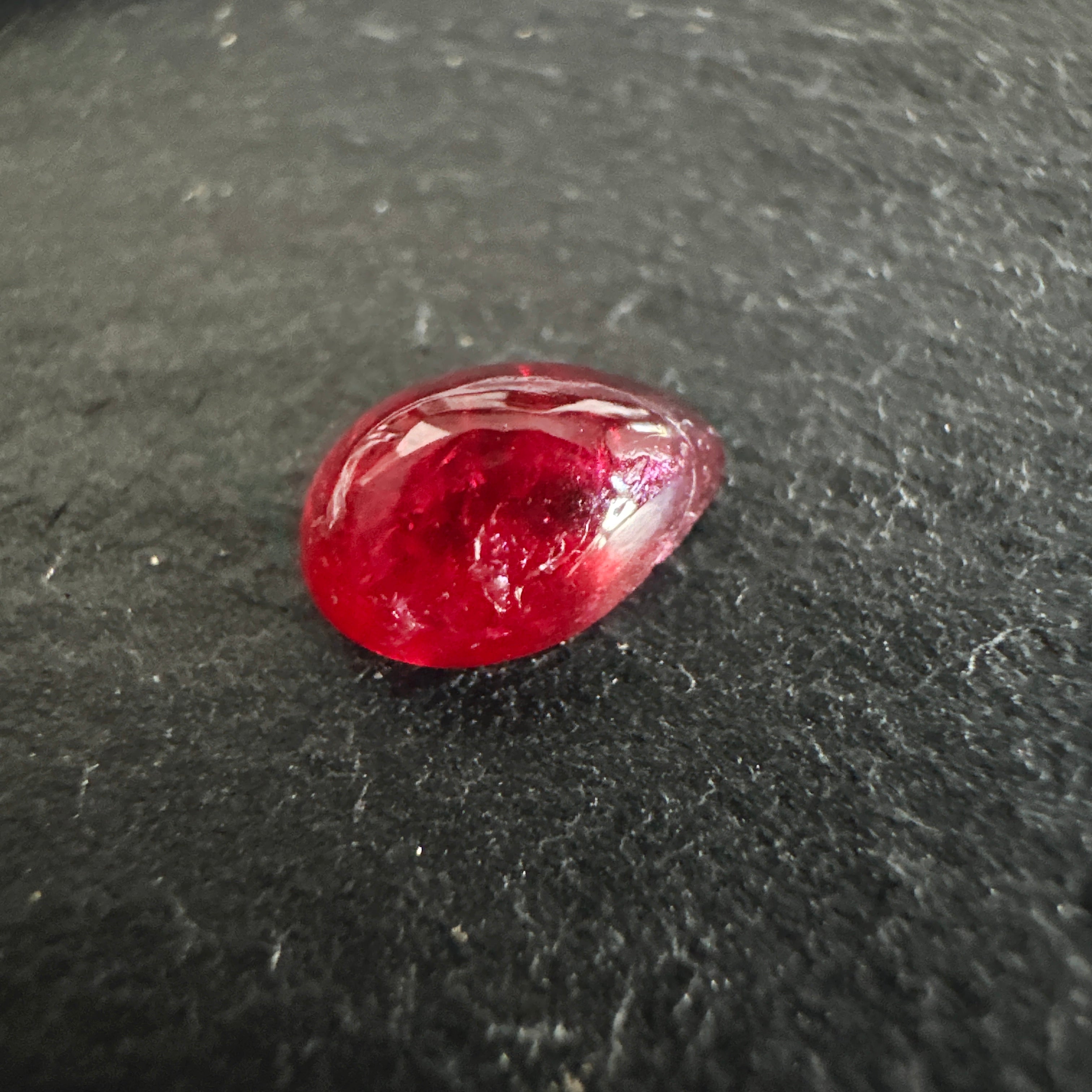 0.84ct Ruby Cabochon, Longido Mines, Tanzania. Untreated Unheated, this cab does have groves on the dome but fantastic colour