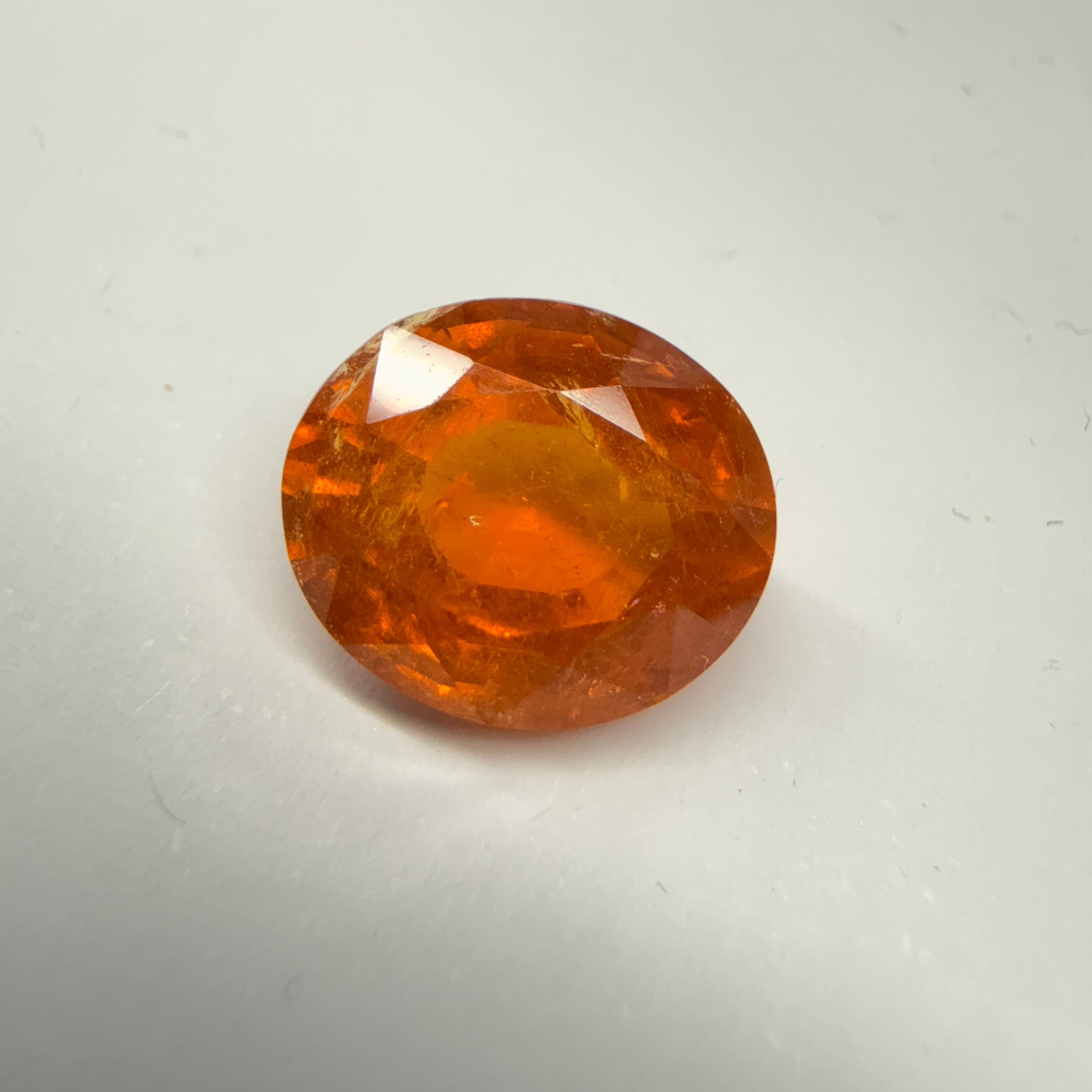 Mandarin Spessartite Garnet, 9.09ct, Untreated Unheated. 12.8 x 11.2 x 6.8mm, stone has some veils, slight sugar and inclusions