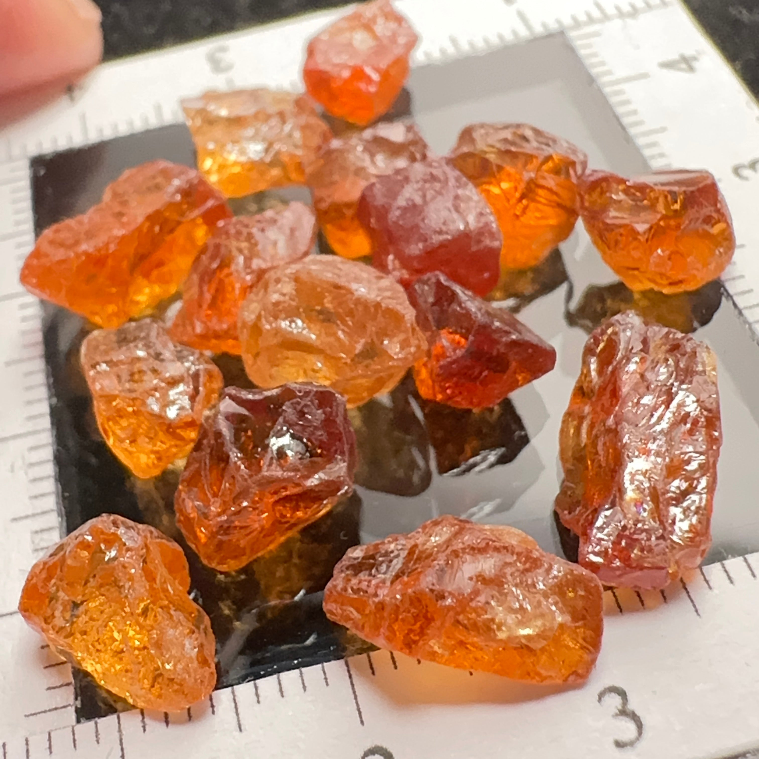 Spessartite lot, 44.11ct, mixed clarities, Tanzania, av. size 2.94ct