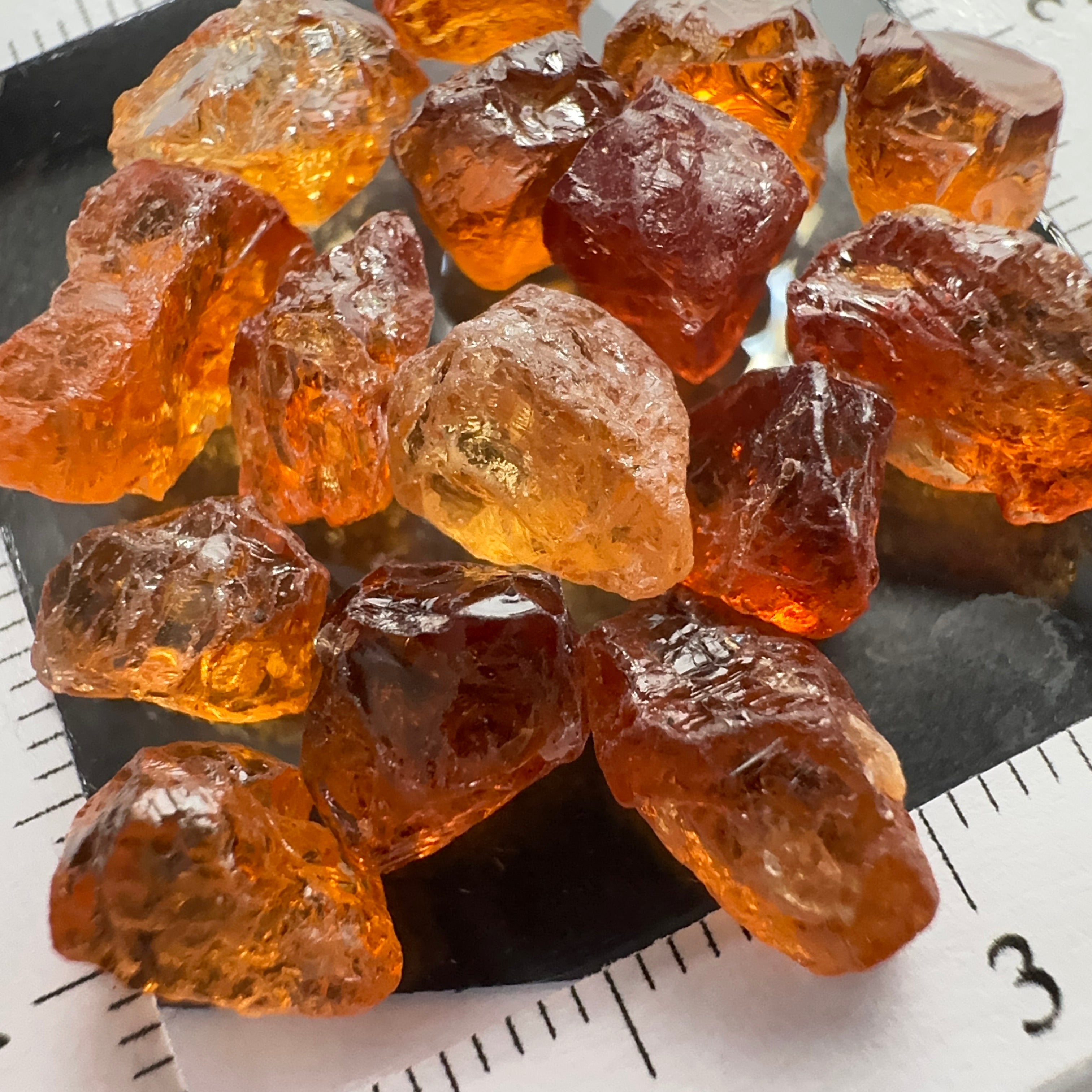 Spessartite lot, 44.11ct, mixed clarities, Tanzania, av. size 2.94ct