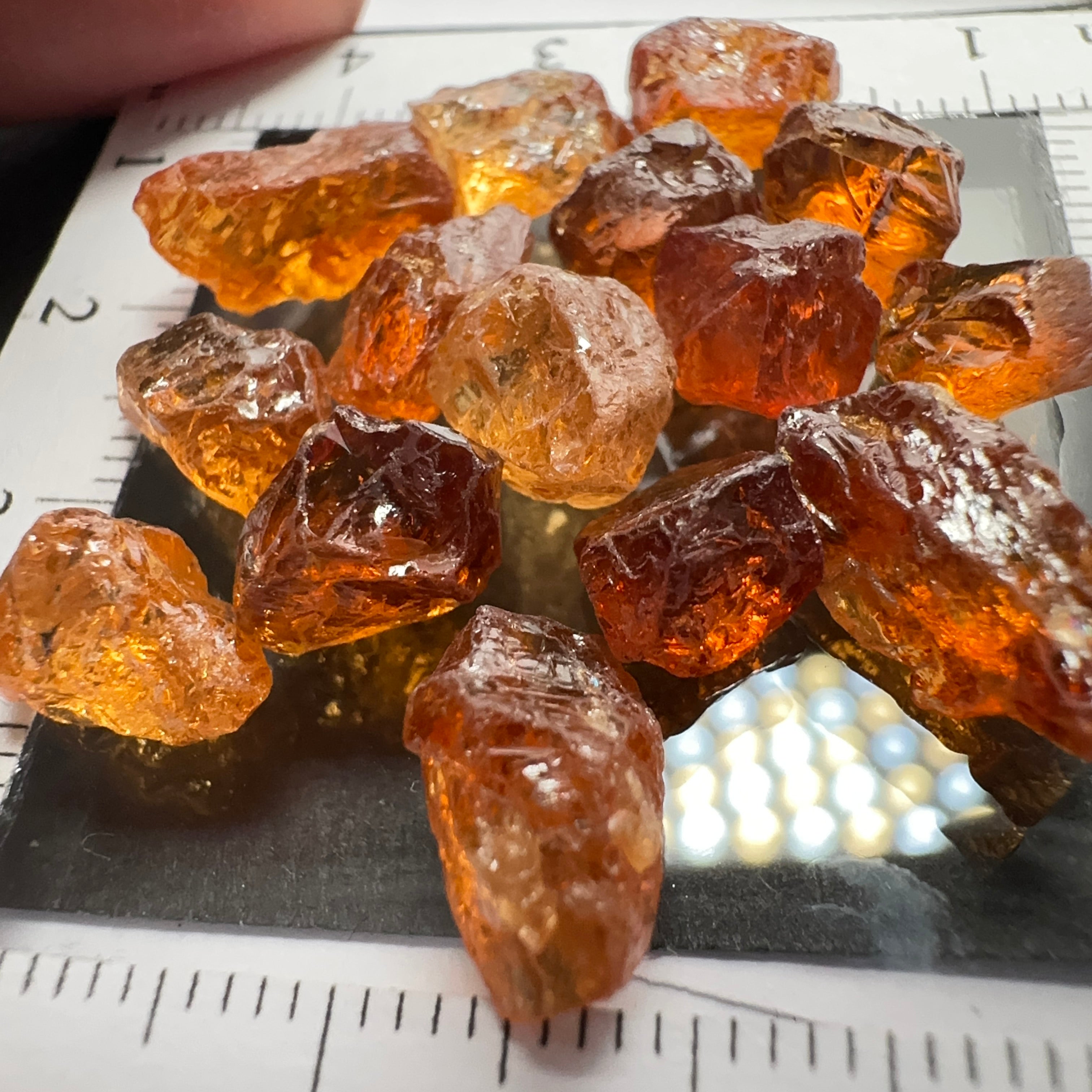 Spessartite lot, 44.11ct, mixed clarities, Tanzania, av. size 2.94ct