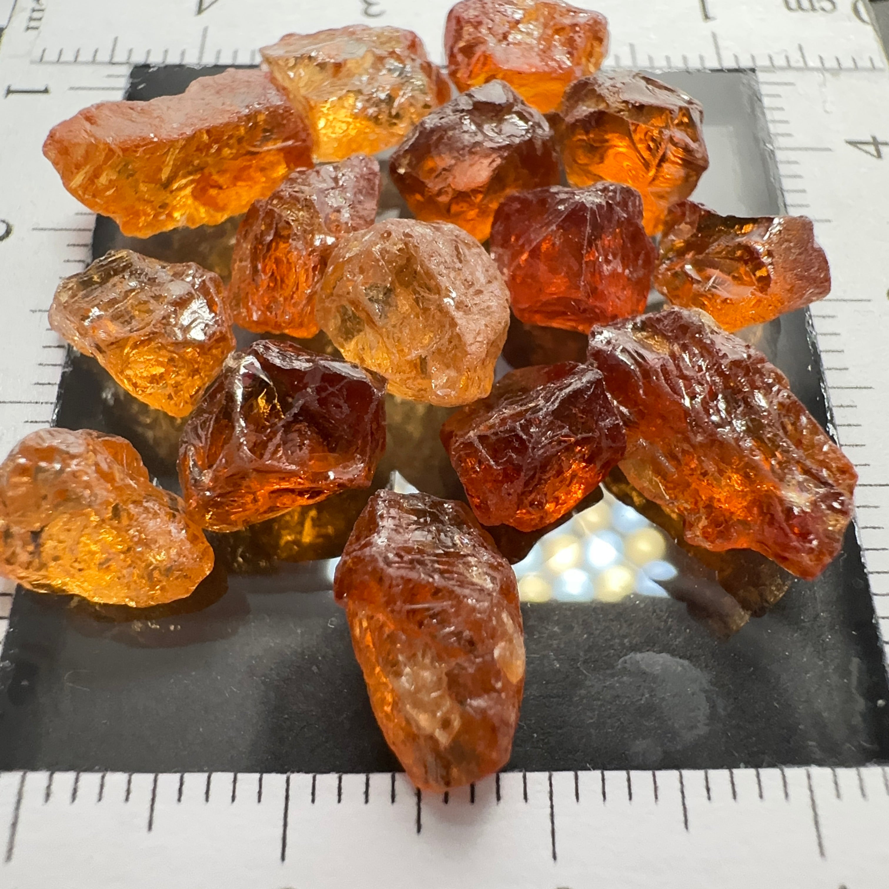 Spessartite lot, 44.11ct, mixed clarities, Tanzania, av. size 2.94ct