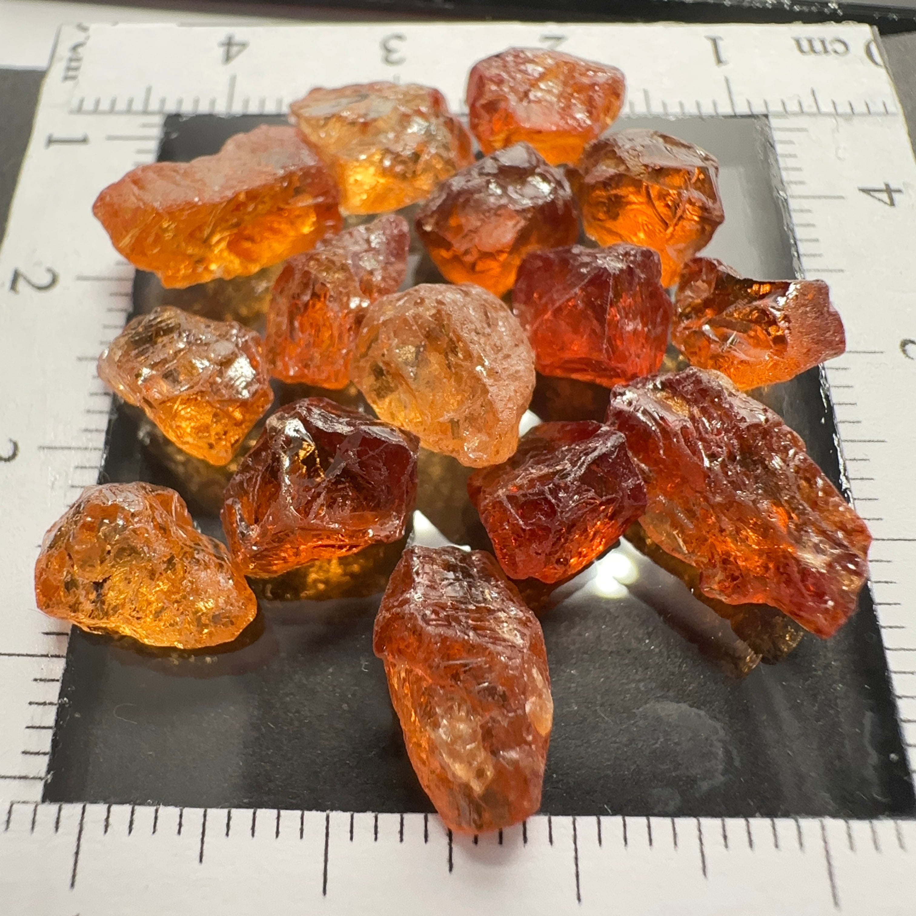 Spessartite lot, 44.11ct, mixed clarities, Tanzania, av. size 2.94ct