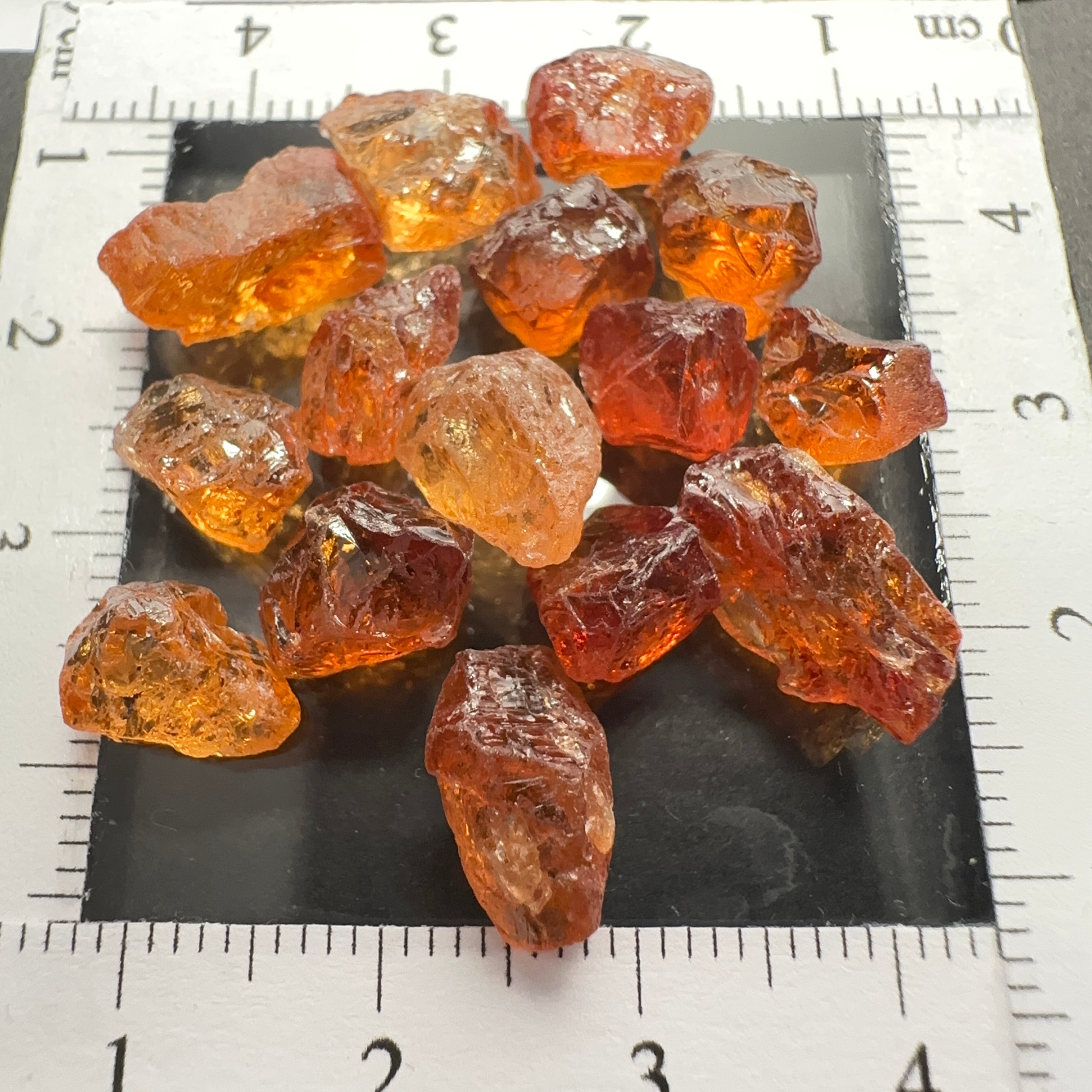 Spessartite lot, 44.11ct, mixed clarities, Tanzania, av. size 2.94ct