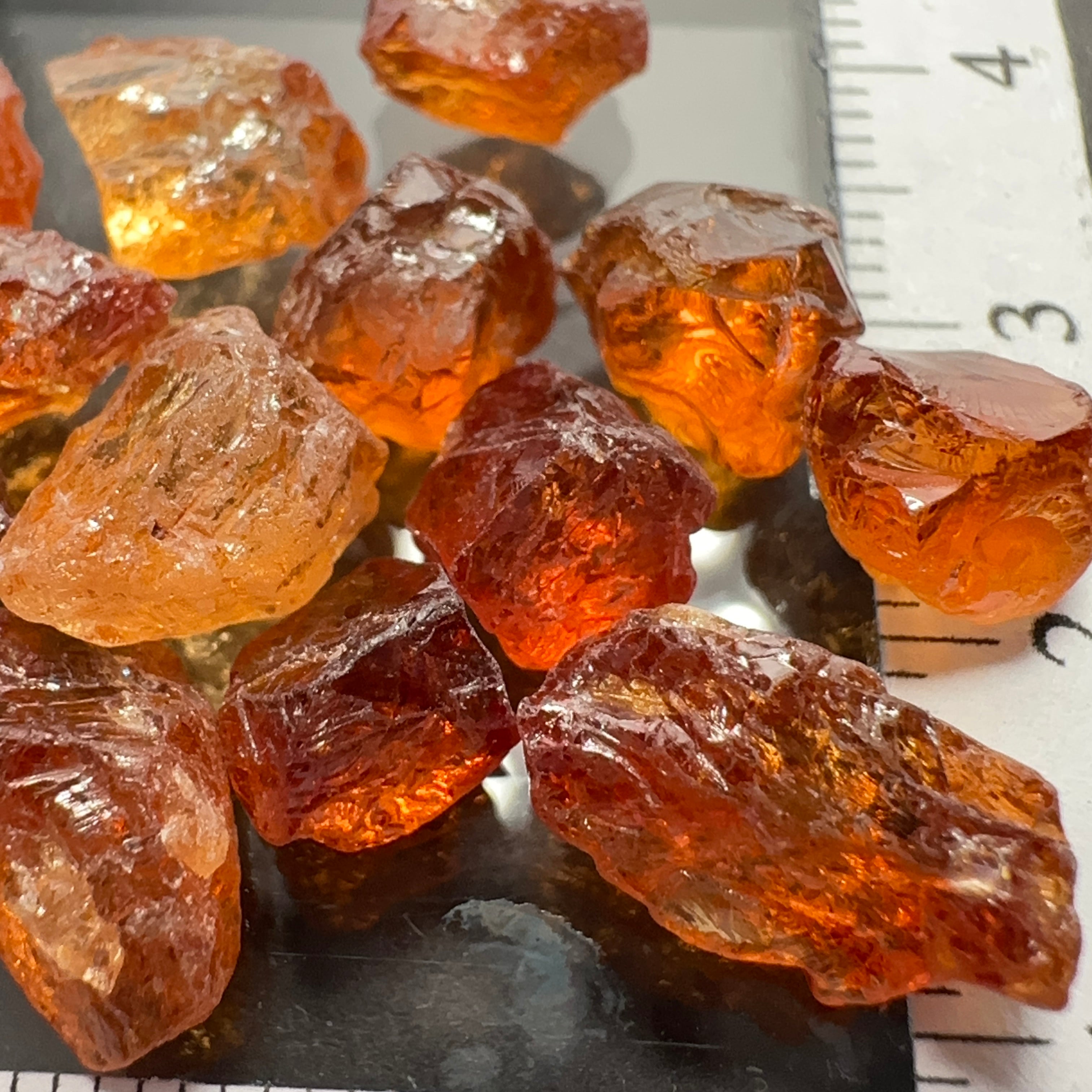 Spessartite lot, 44.11ct, mixed clarities, Tanzania, av. size 2.94ct