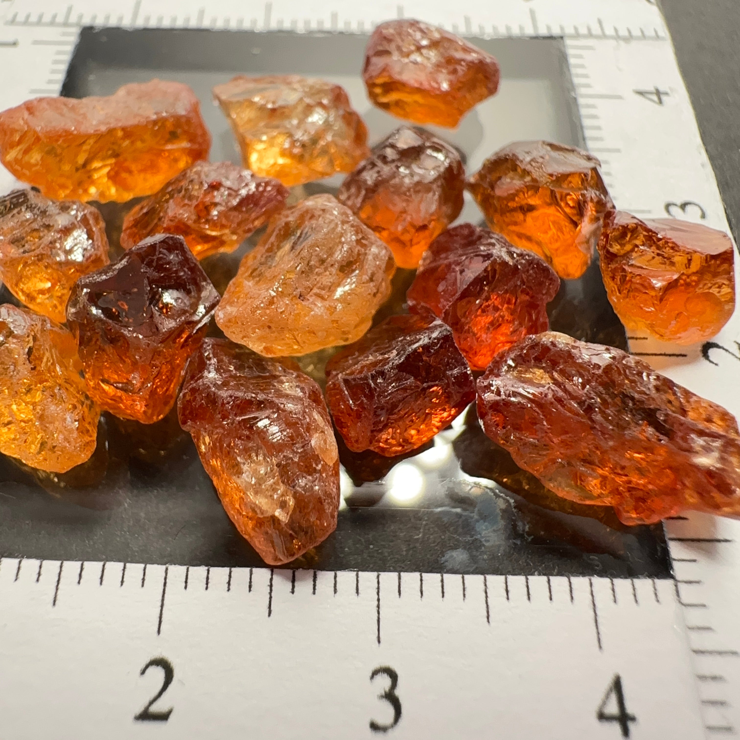 Spessartite lot, 44.11ct, mixed clarities, Tanzania, av. size 2.94ct