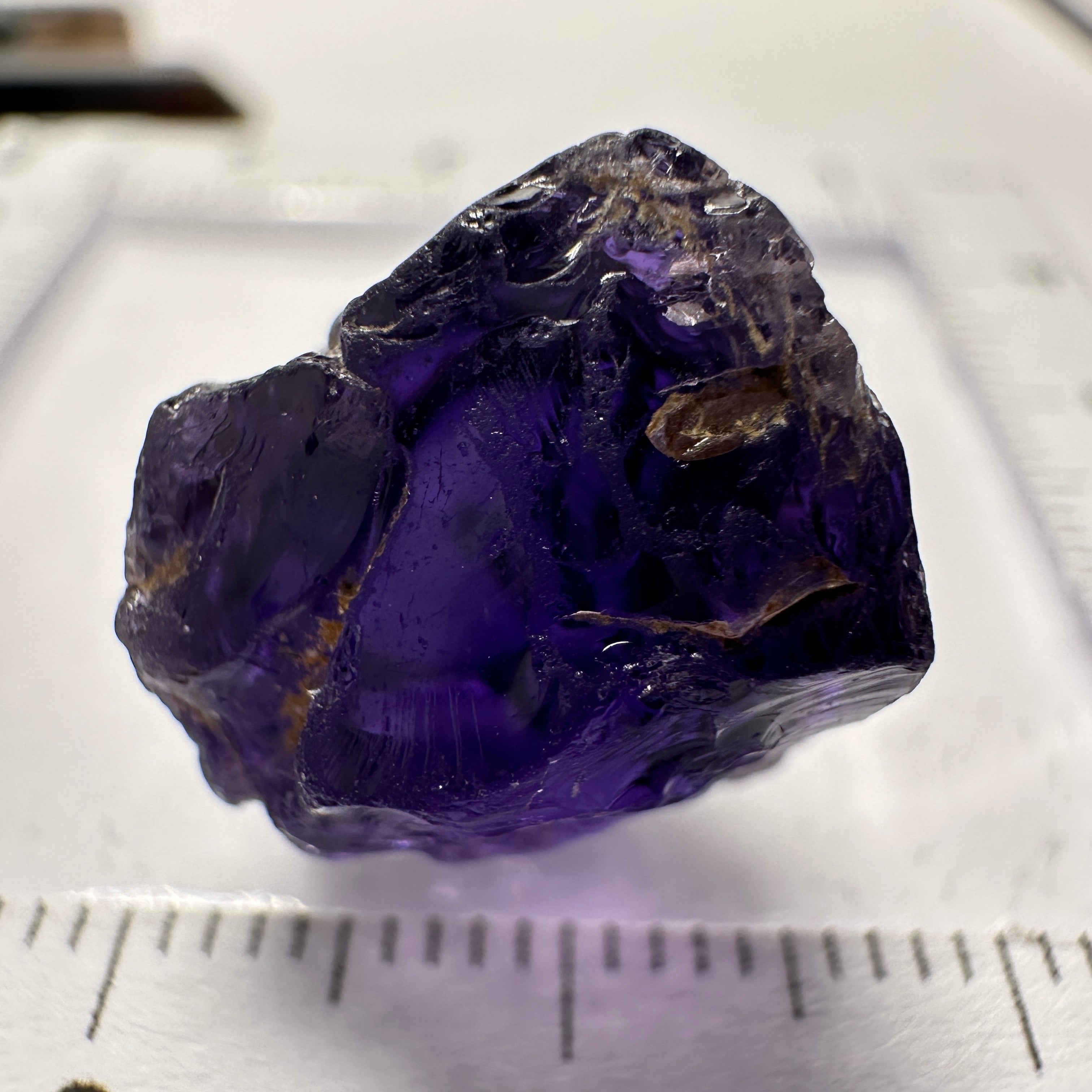 Purple Scapolite Crystal, 16.60ct, Tanzania, Untreated Unheated.VVS-IF clean with a single tiny spot 3mm into the stone, you can cut with it, will not be seen with the naked eye once cut, there is a crack on the outside which will come off in pre-forming