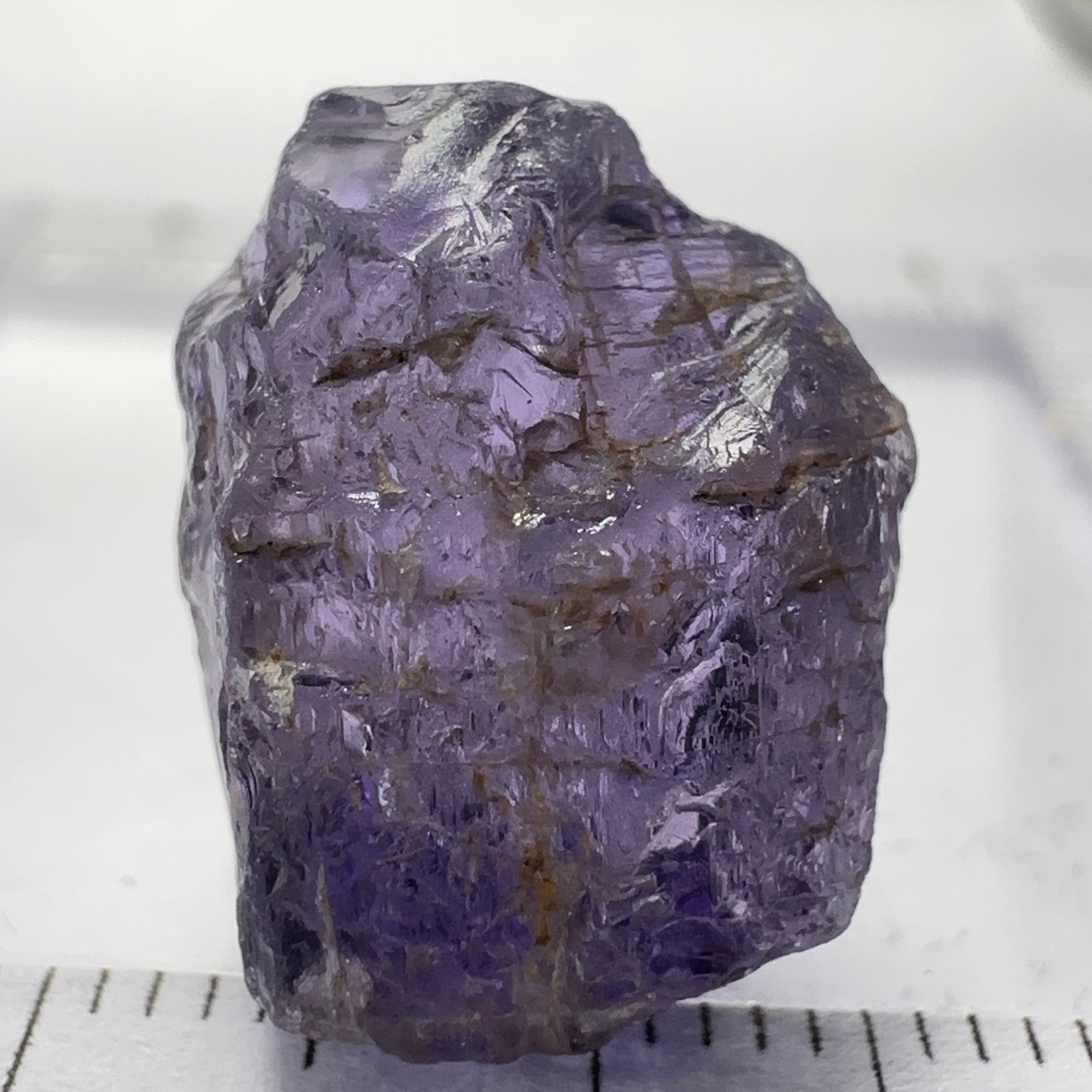 Purple Scapolite Crystal, 16.60ct, Tanzania, Untreated Unheated.VVS-IF clean with a single tiny spot 3mm into the stone, you can cut with it, will not be seen with the naked eye once cut, there is a crack on the outside which will come off in pre-forming