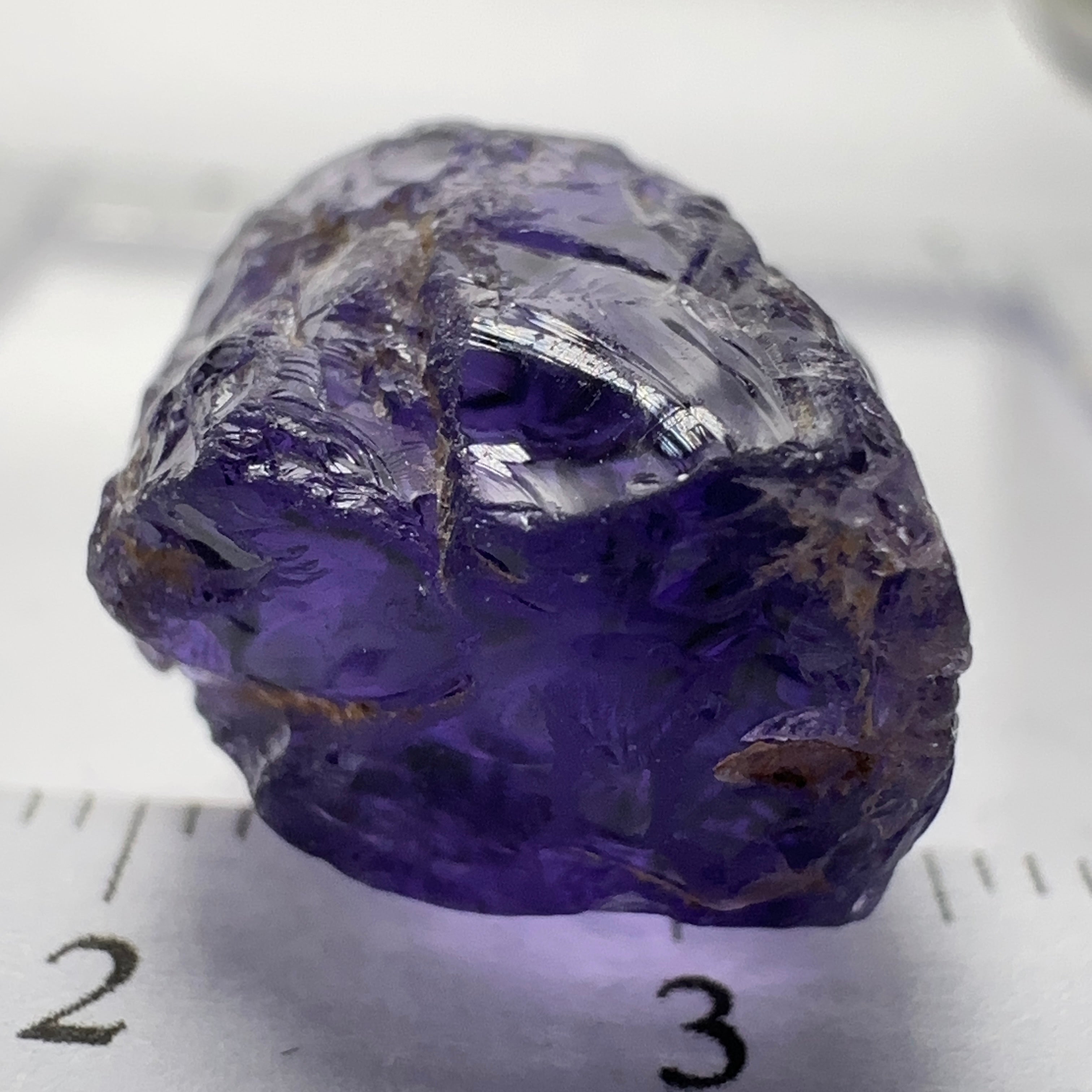 Purple Scapolite Crystal, 16.60ct, Tanzania, Untreated Unheated.VVS-IF clean with a single tiny spot 3mm into the stone, you can cut with it, will not be seen with the naked eye once cut, there is a crack on the outside which will come off in pre-forming