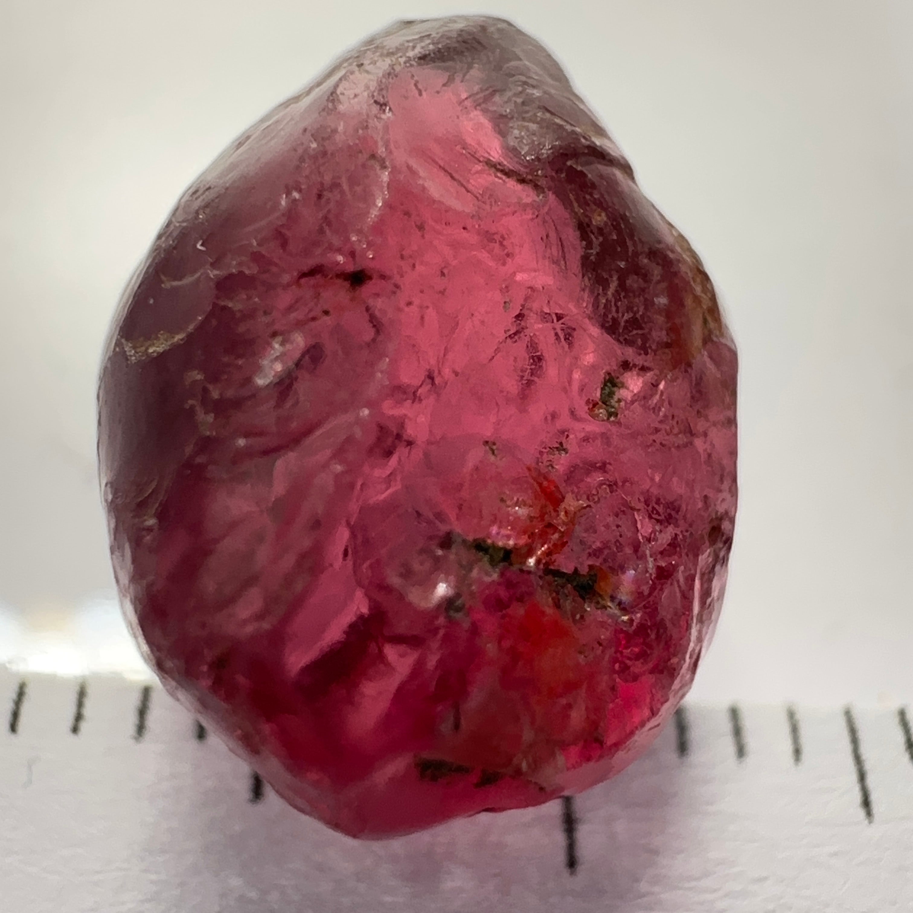 Rhodolite Garnet Colour Shifting, 8.46ct, Umba, Tanzania, Untreated Untreated. Slight skin issue (2mm on one side) will come off on faceting, rest vvs-if