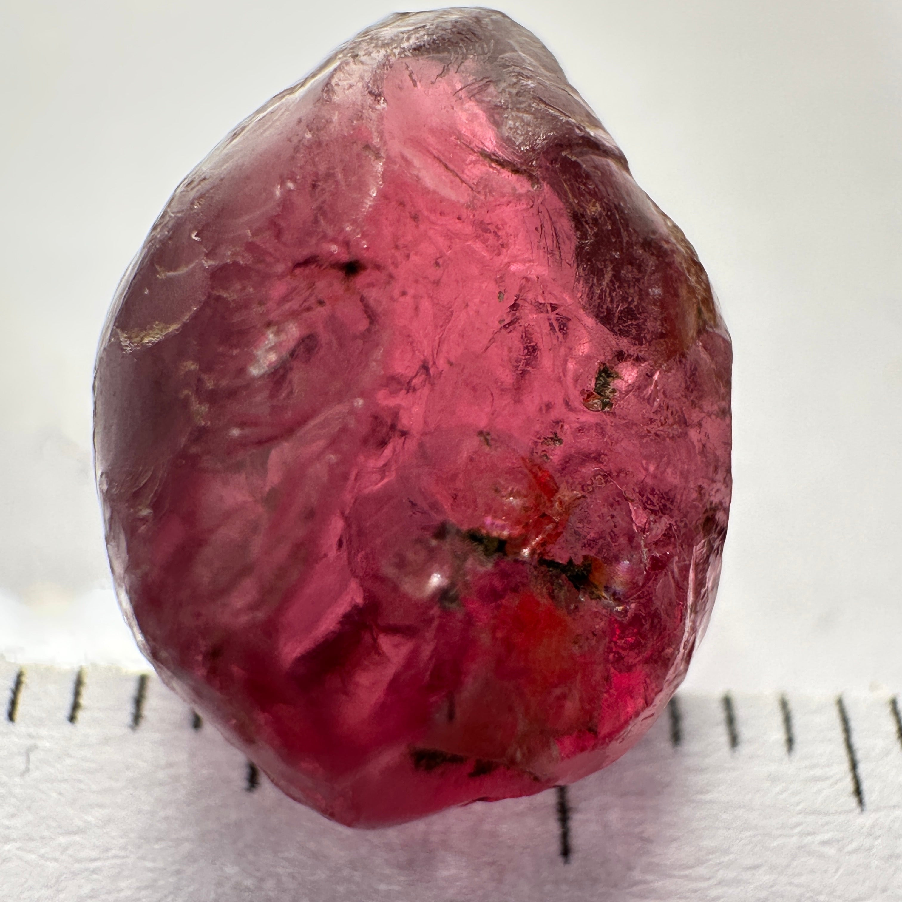 Rhodolite Garnet Colour Shifting, 8.46ct, Umba, Tanzania, Untreated Untreated. Slight skin issue (2mm on one side) will come off on faceting, rest vvs-if