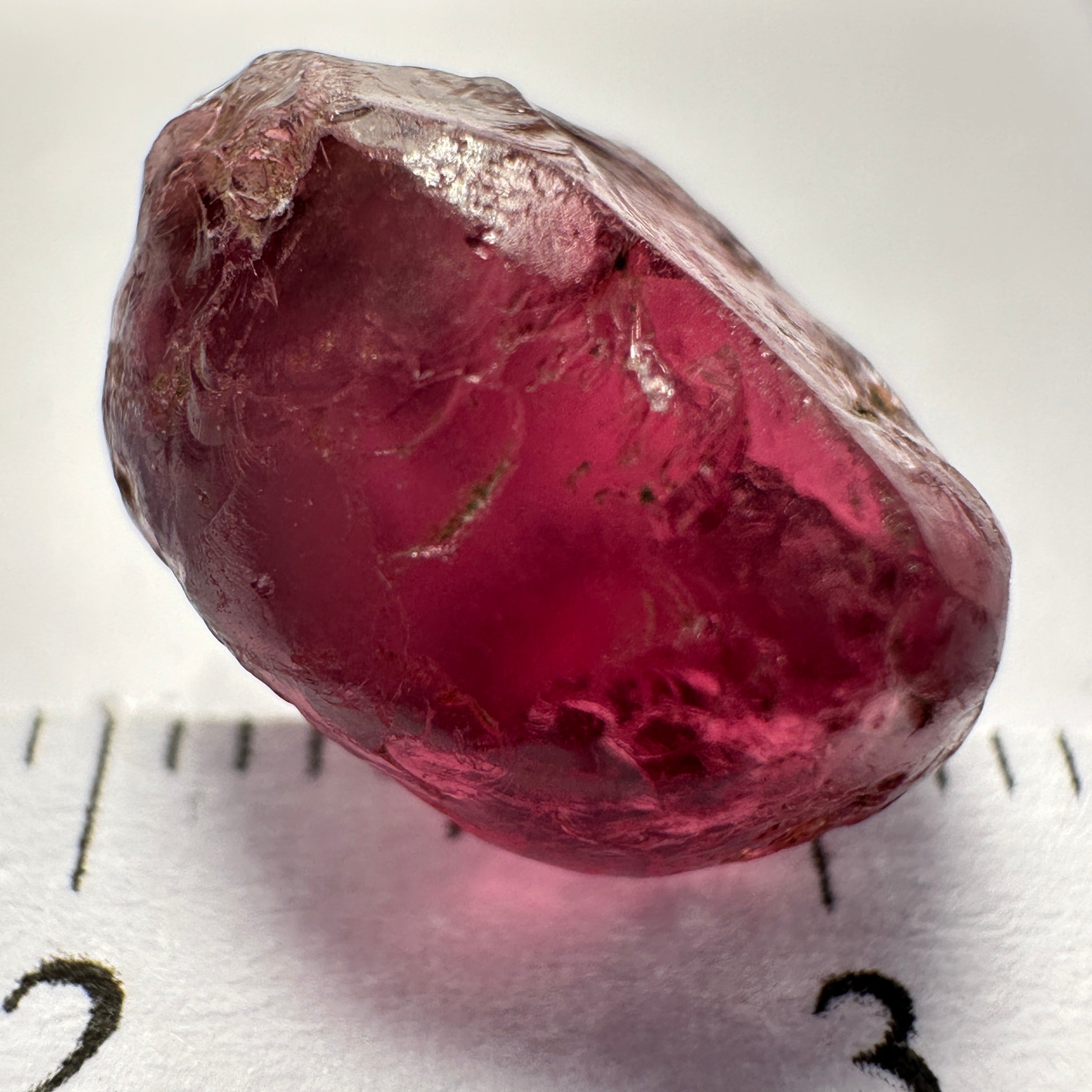 Rhodolite Garnet Colour Shifting, 8.46ct, Umba, Tanzania, Untreated Untreated. Slight skin issue (2mm on one side) will come off on faceting, rest vvs-if