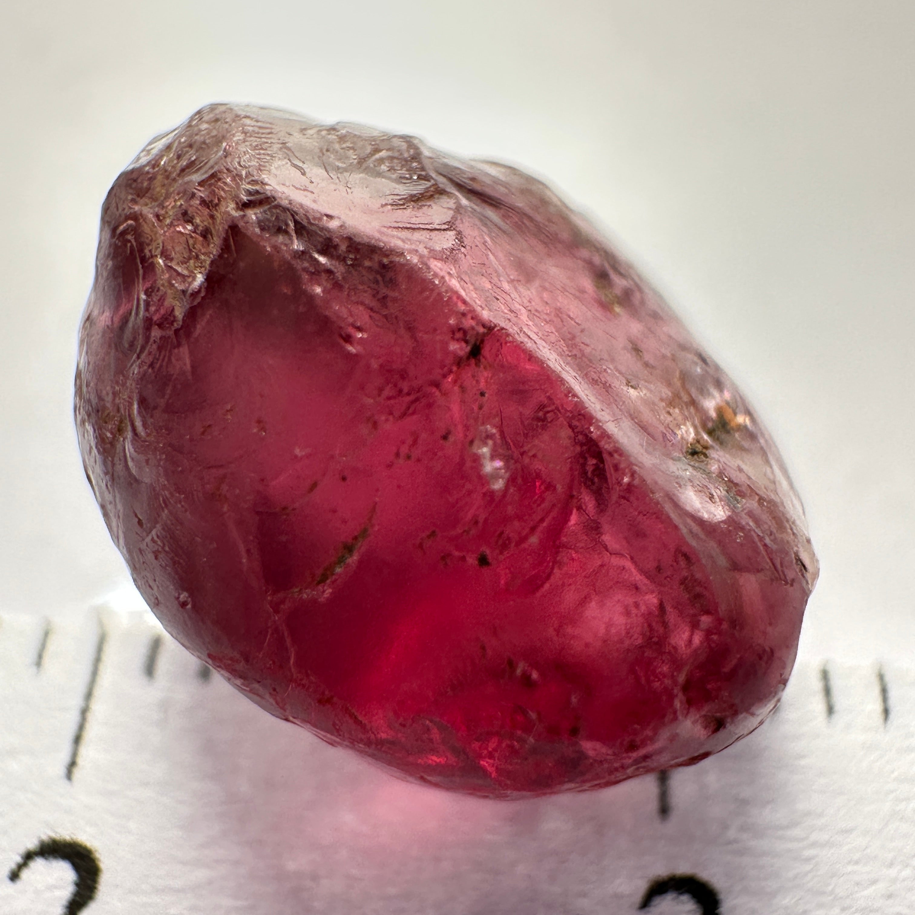 Rhodolite Garnet Colour Shifting, 8.46ct, Umba, Tanzania, Untreated Untreated. Slight skin issue (2mm on one side) will come off on faceting, rest vvs-if