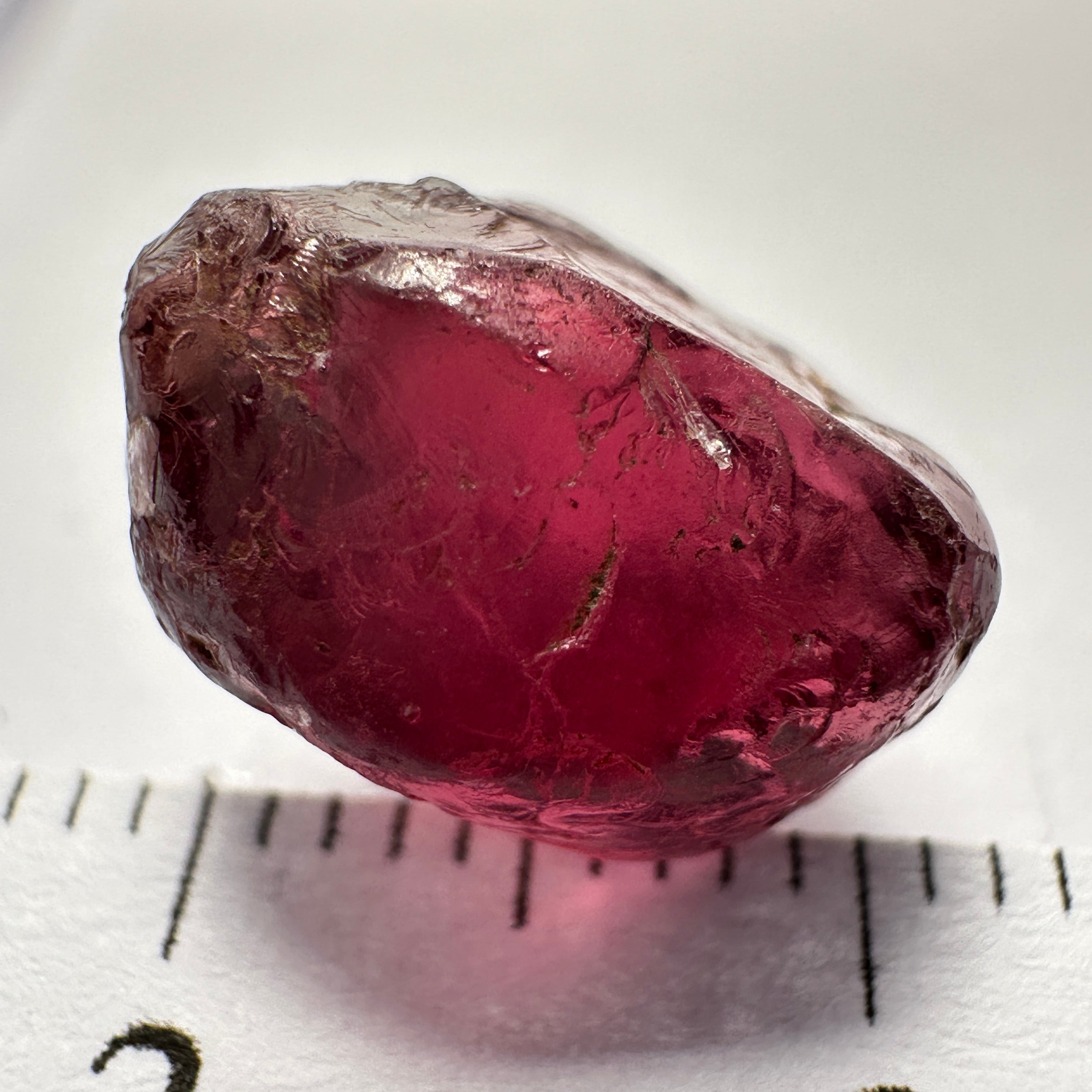 Rhodolite Garnet Colour Shifting, 8.46ct, Umba, Tanzania, Untreated Untreated. Slight skin issue (2mm on one side) will come off on faceting, rest vvs-if